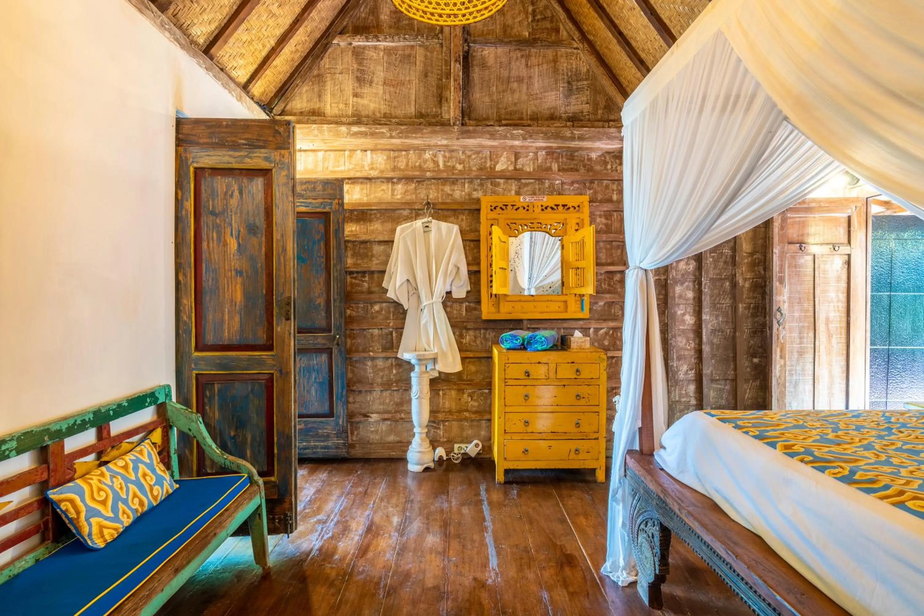 Bed in Kai's Beachfront Villa