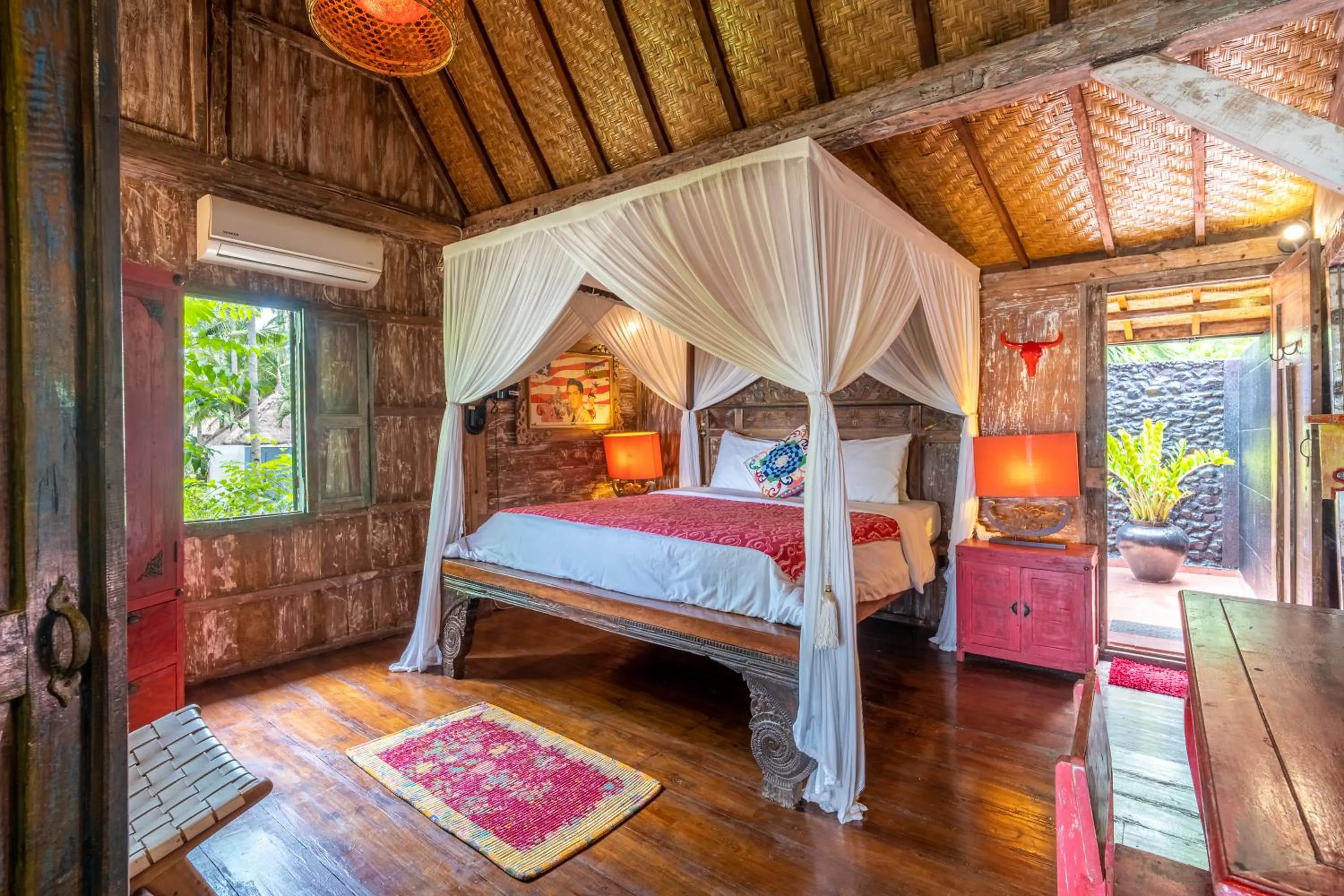 Bed in Kai's Beachfront Villa