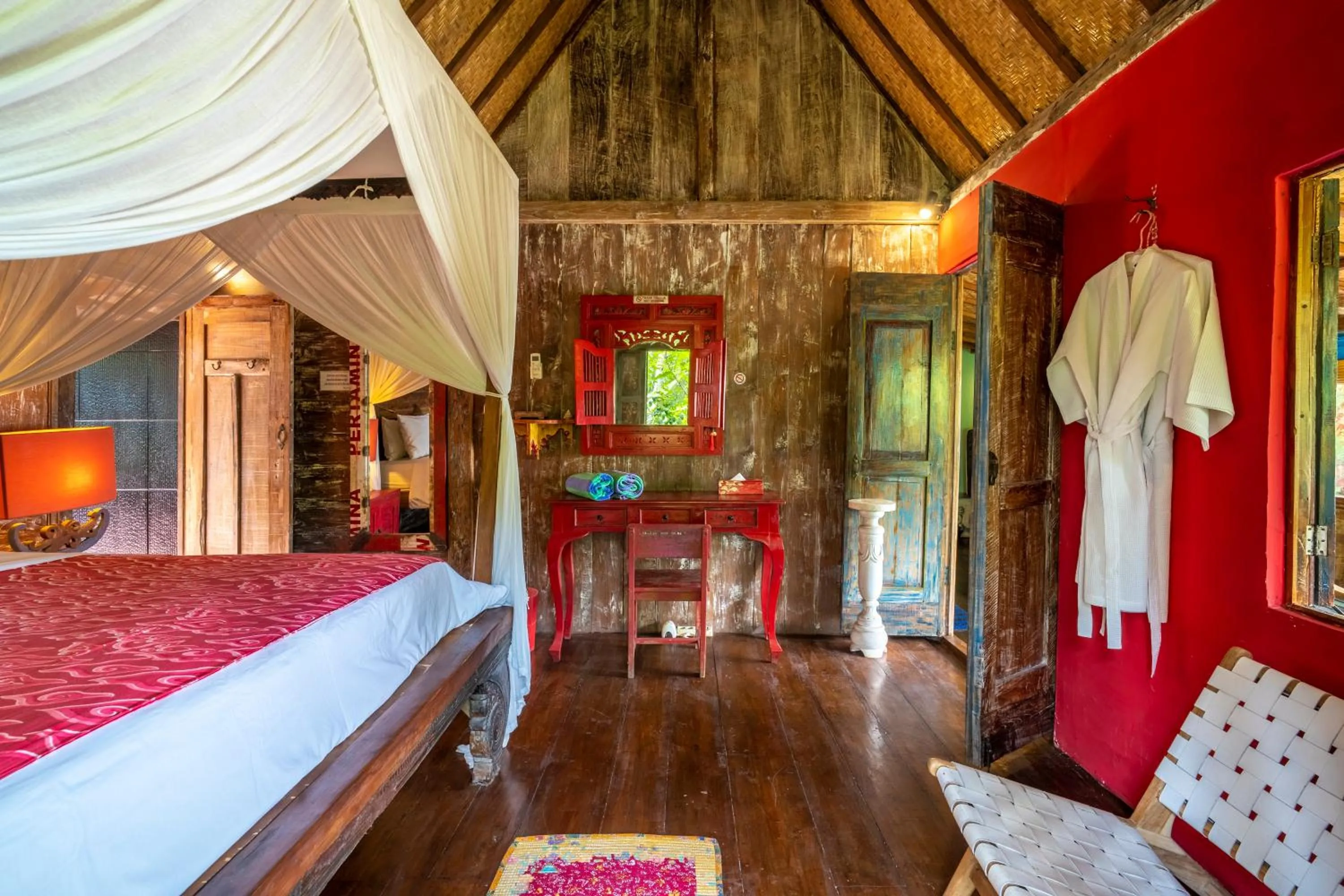Bed in Kai's Beachfront Villa