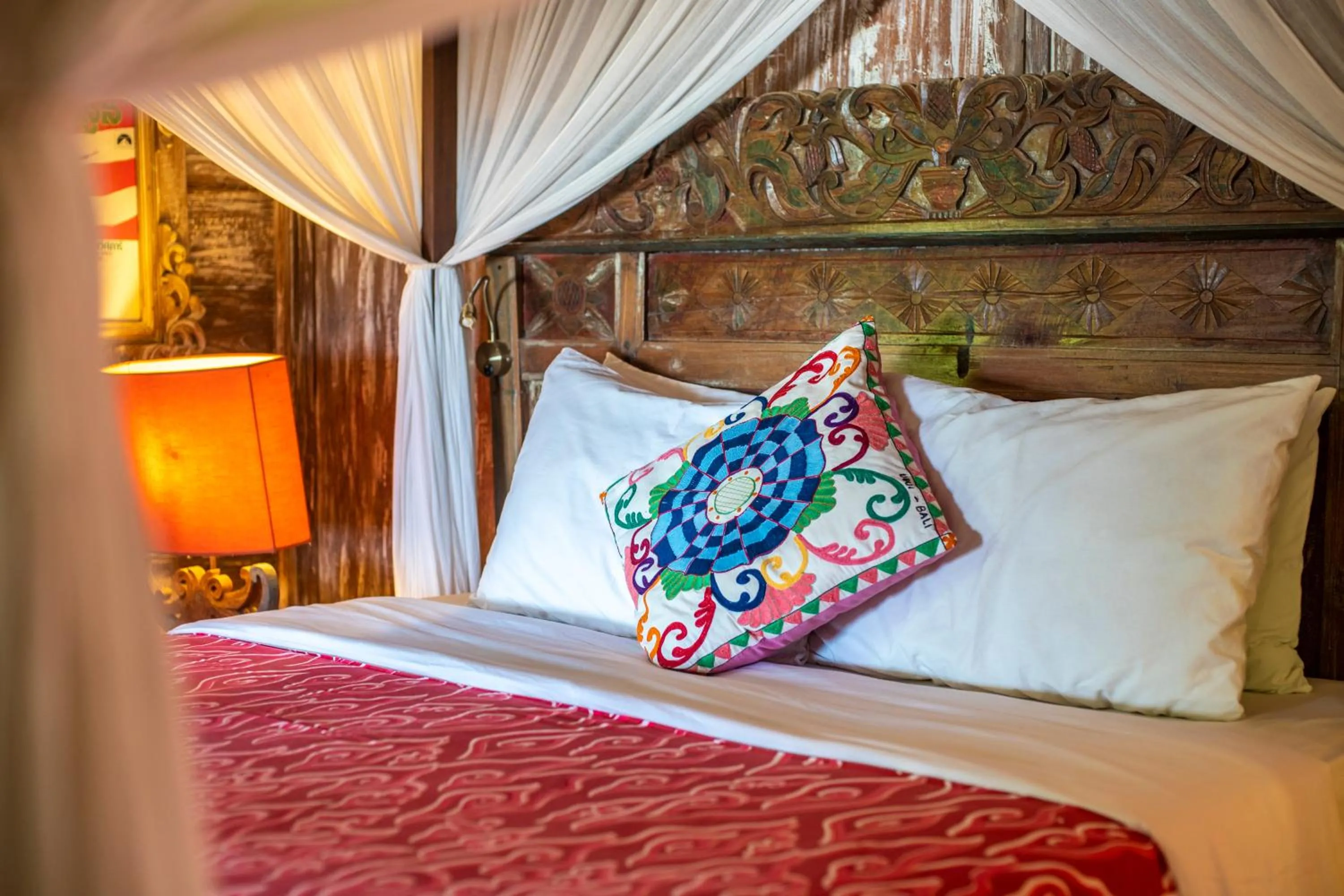 Bed in Kai's Beachfront Villa