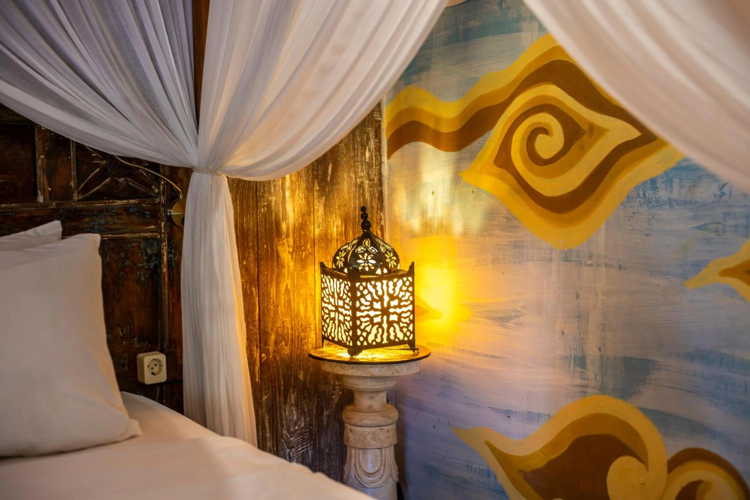 Bed in Kai's Beachfront Villa