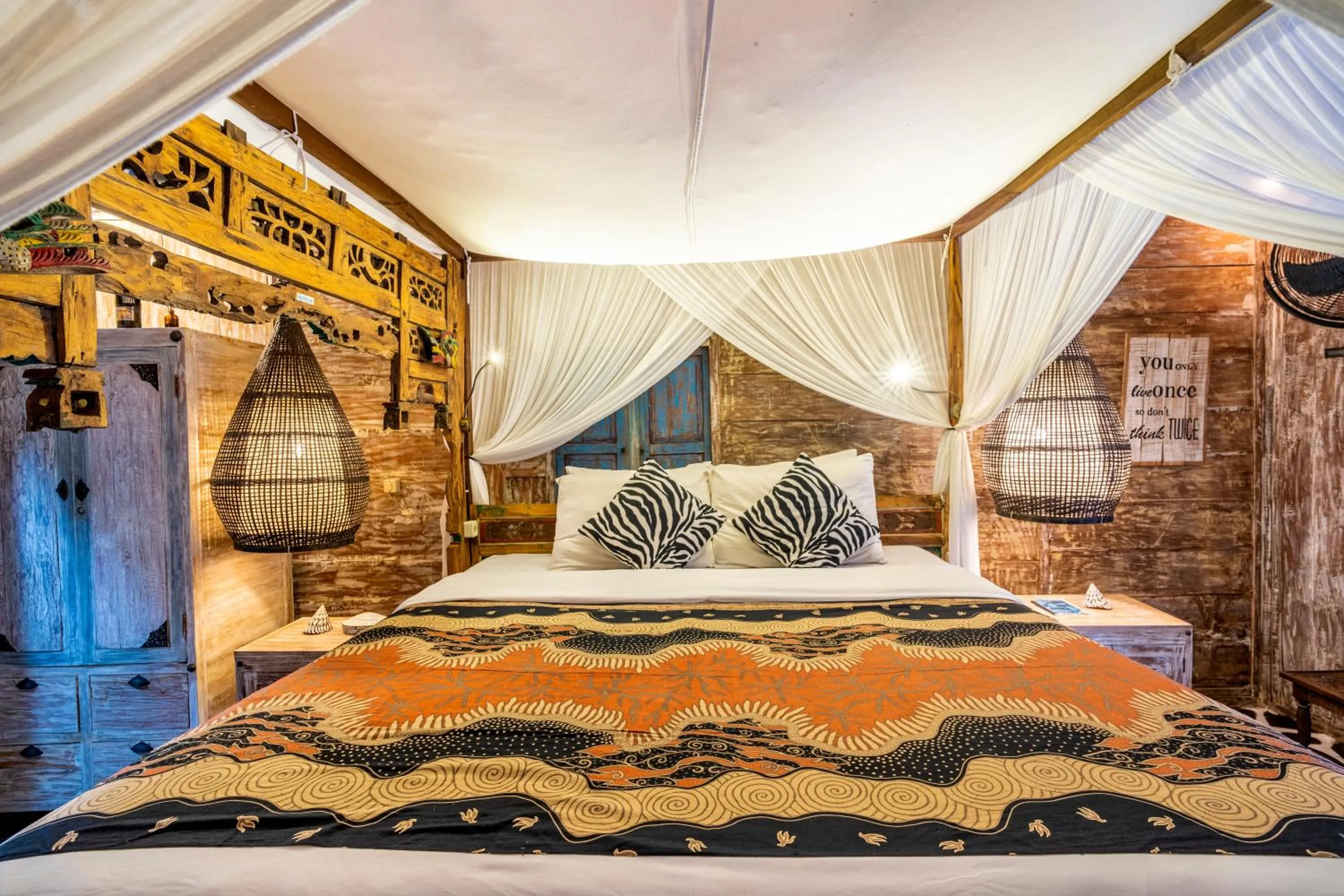 Bed in Kai's Beachfront Villa