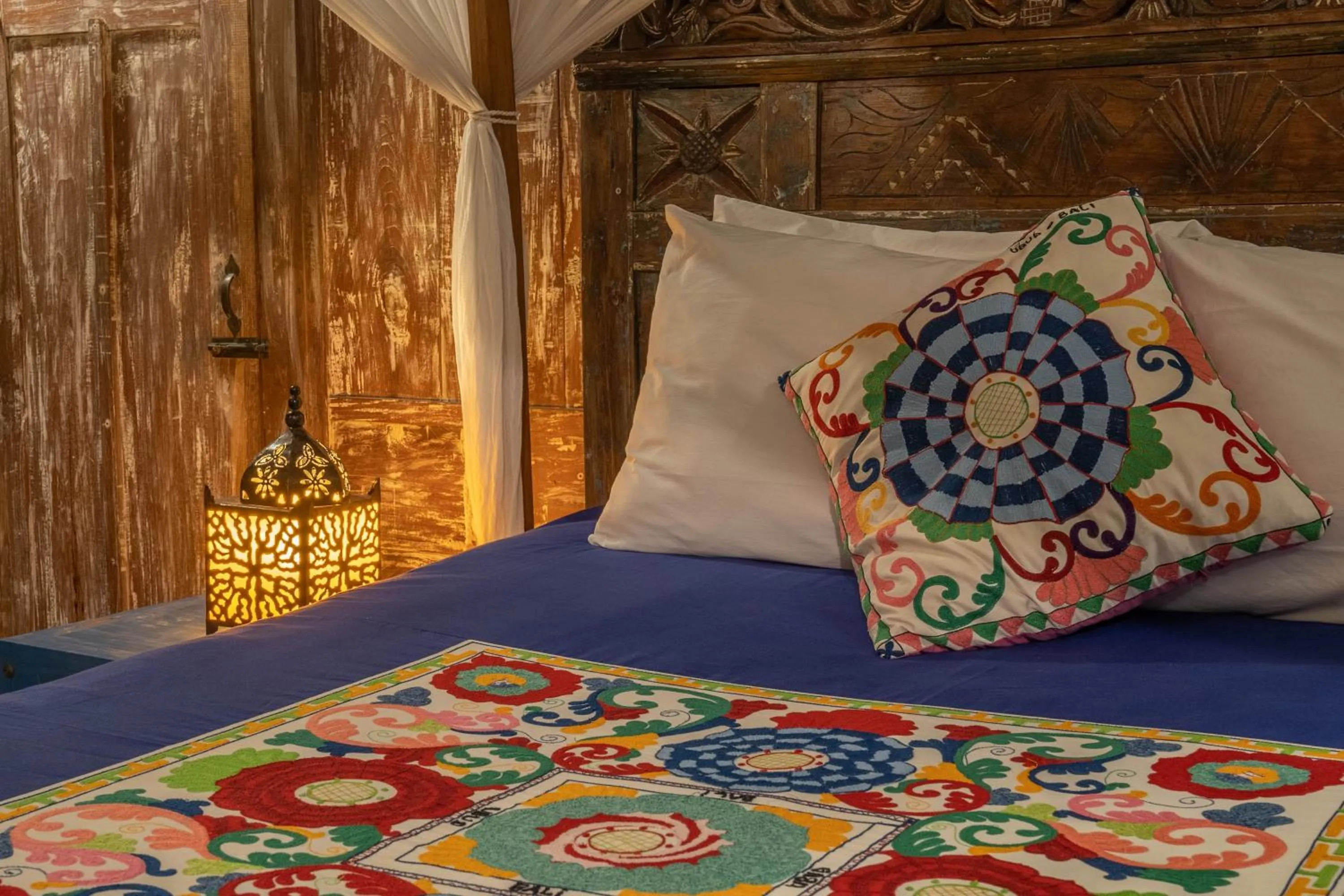 Bed in Kai's Beachfront Villa