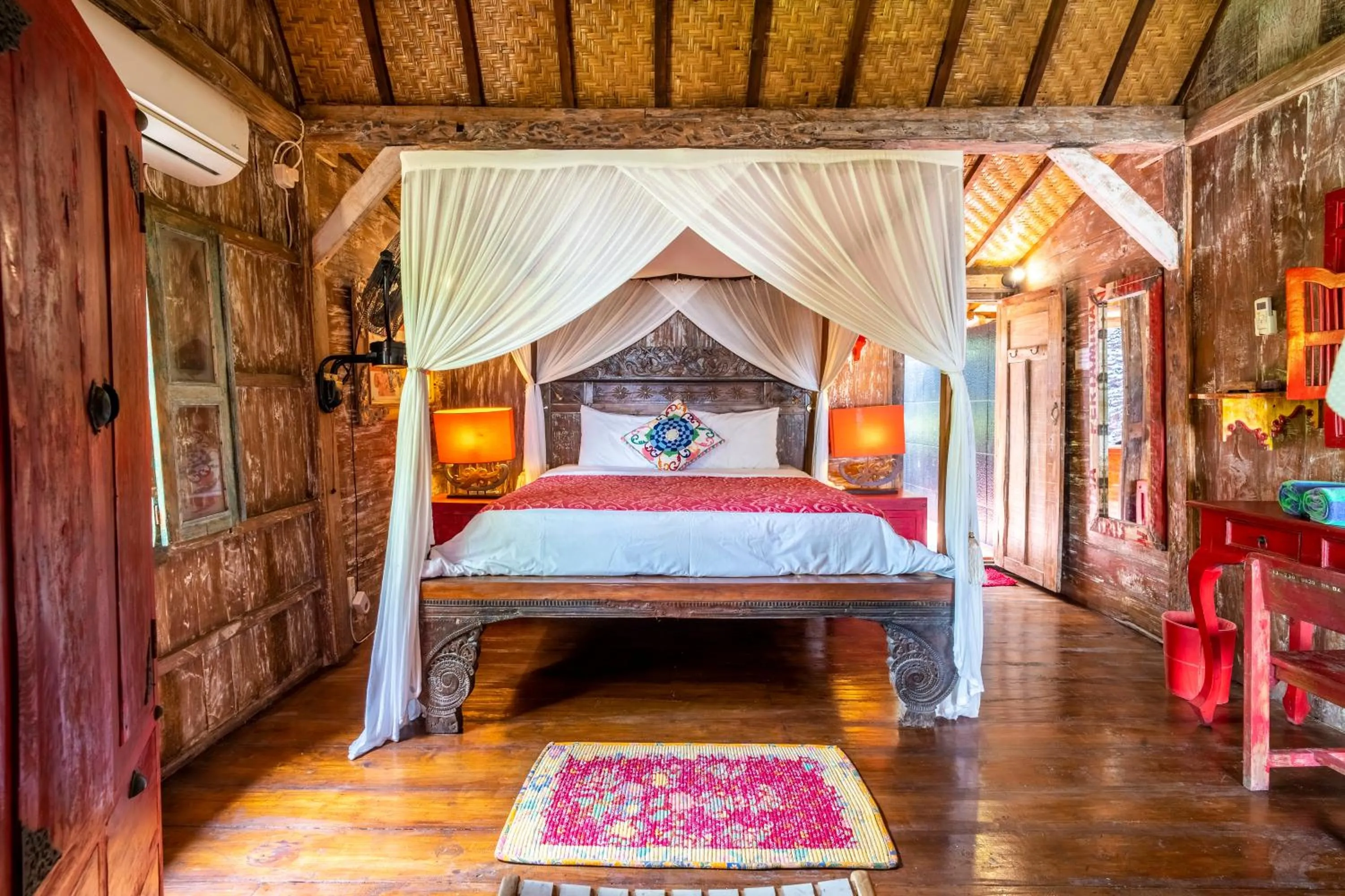 Bed in Kai's Beachfront Villa