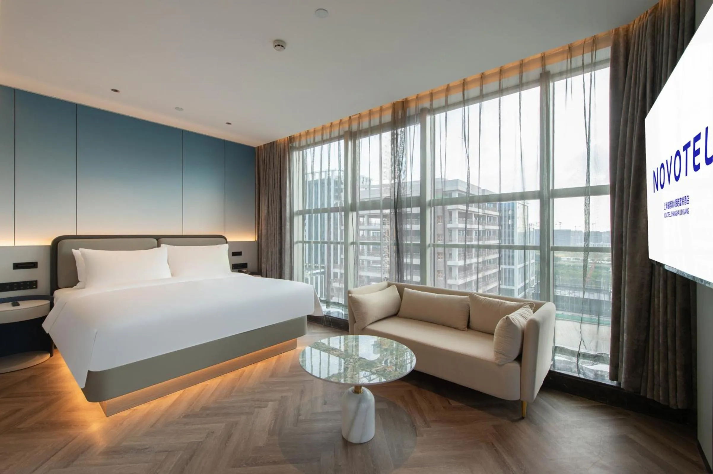View (from property/room), Bed in Novotel Shanghai Lingang