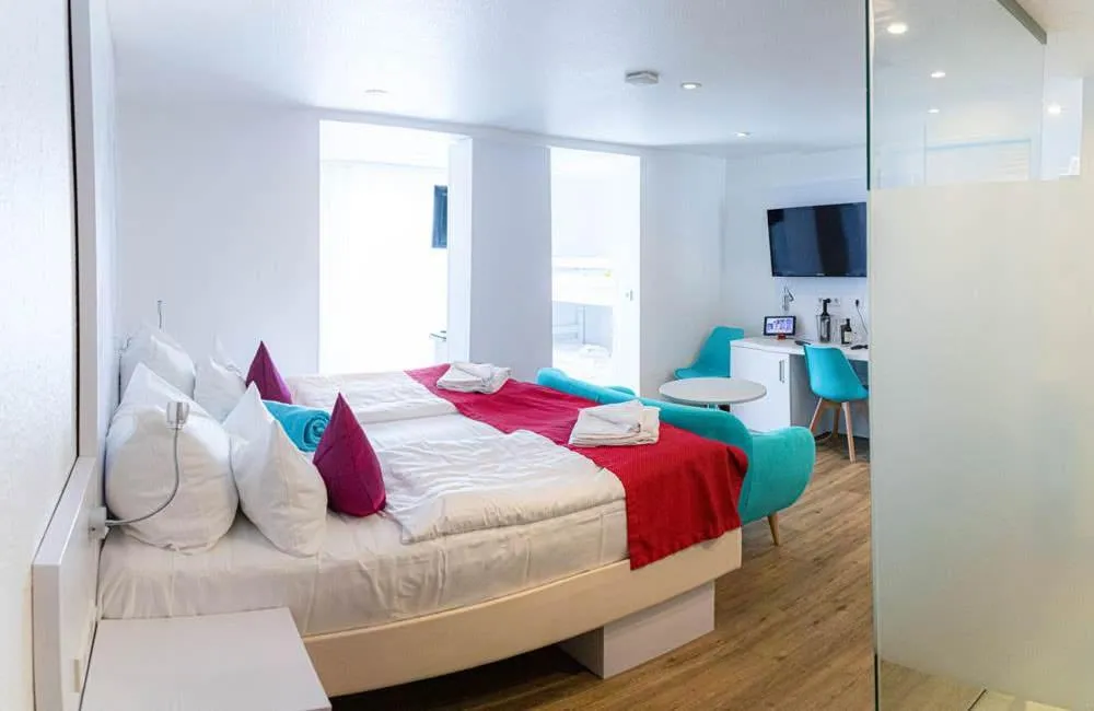 Photo of the whole room, Bed in Ostseehotel Baabe family & SPA