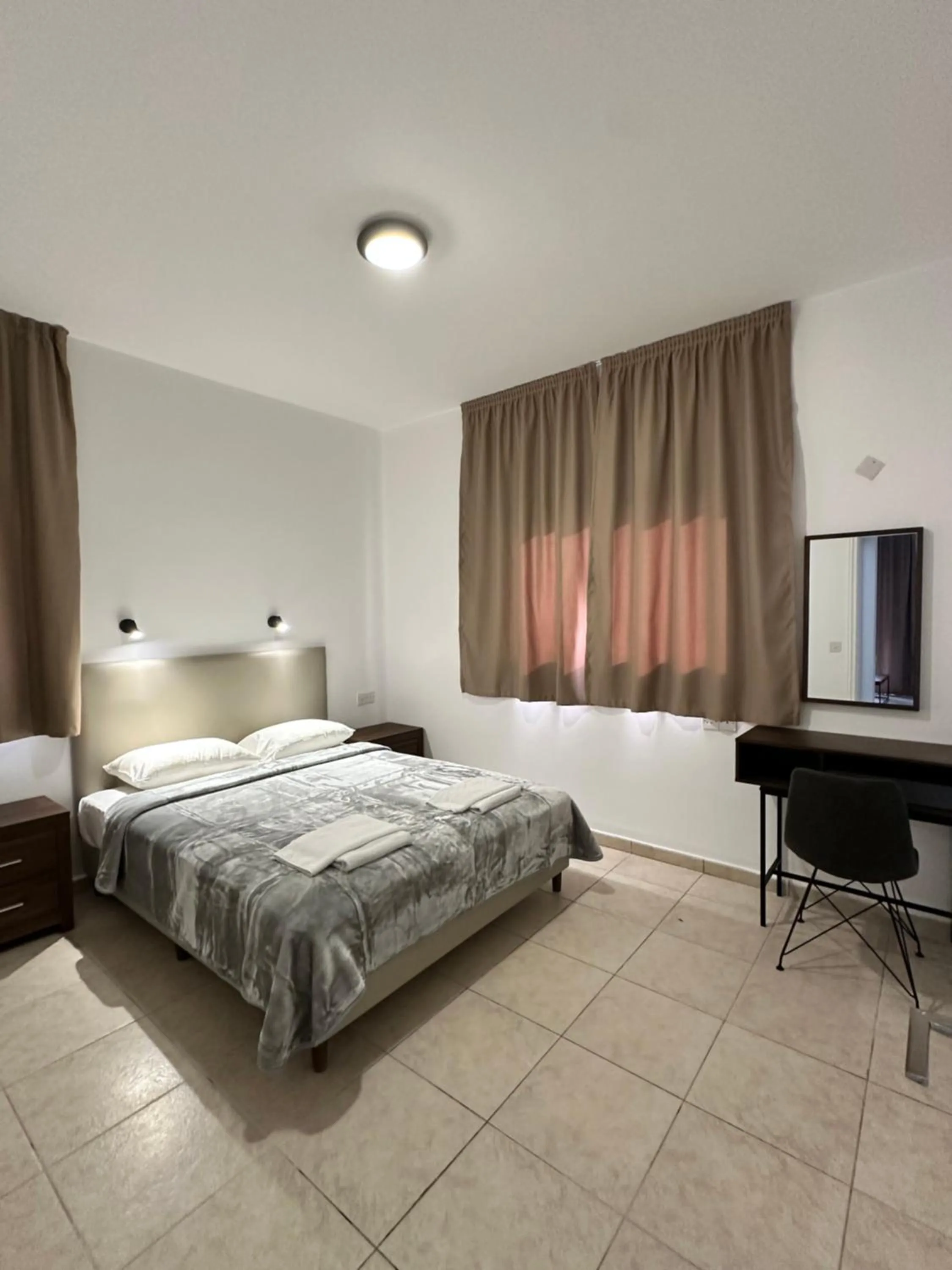 Bed in New York Plaza Hotel Apartments