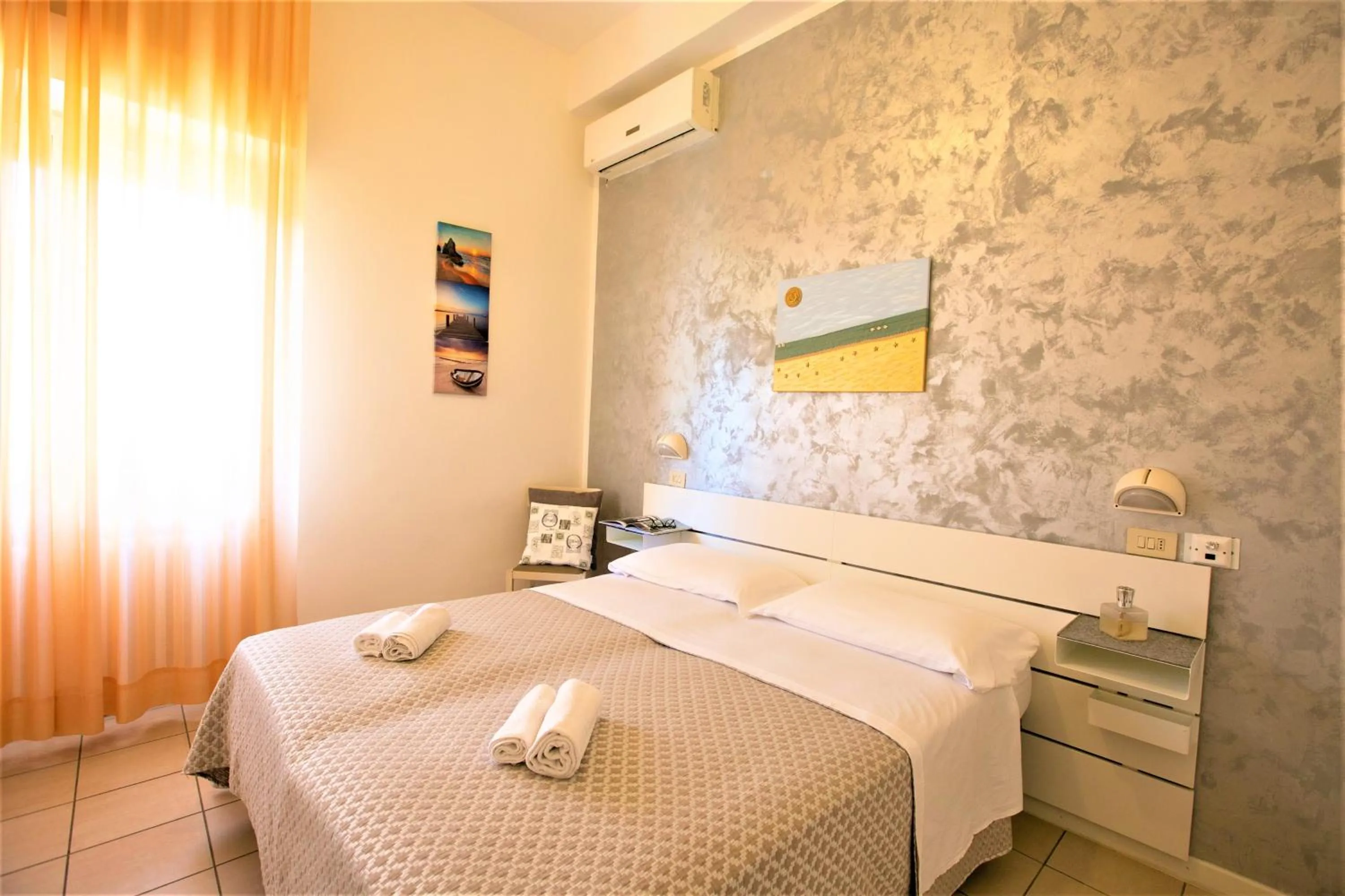 Bed in Villa Gioiosa Beach & Water Park B&B