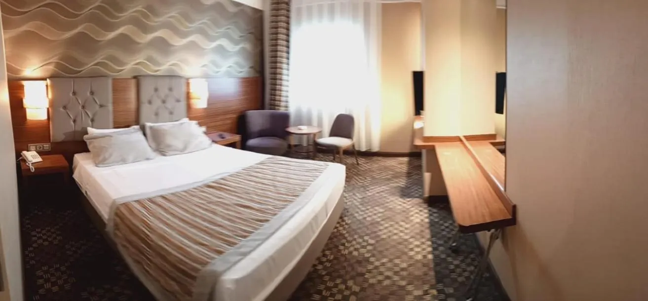 Bed in Adranos Hotel