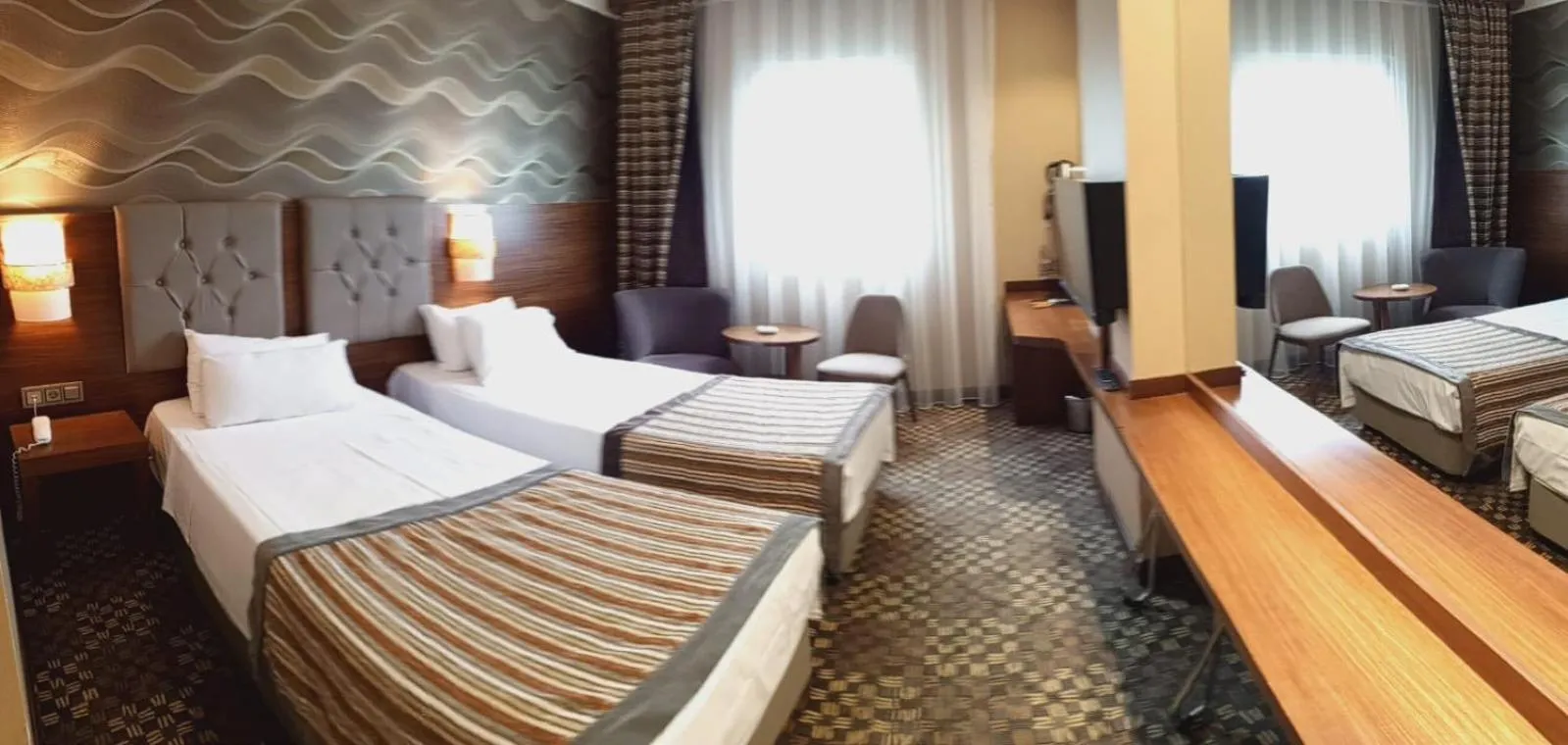 Bed in Adranos Hotel