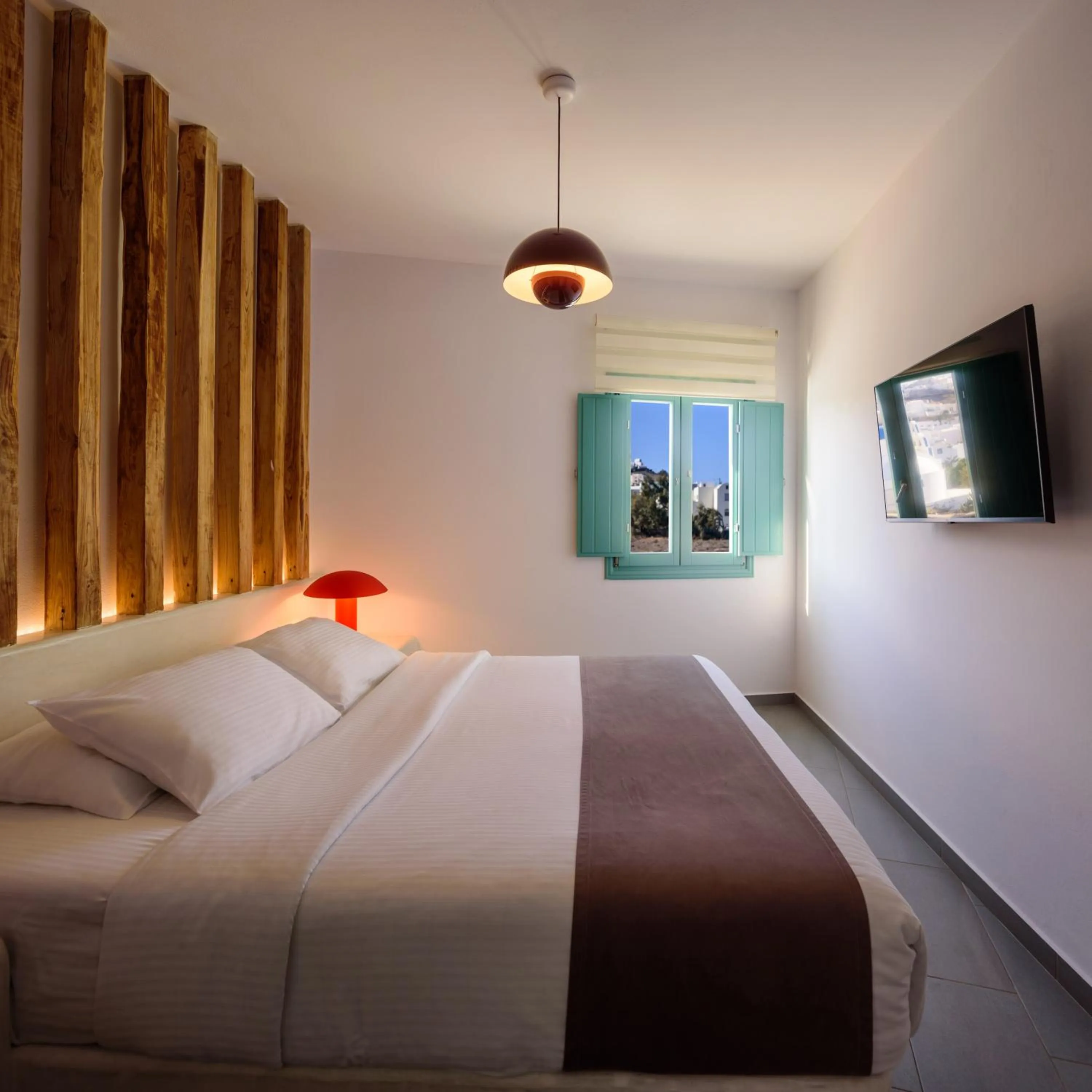 Bed in Neptune Luxury Suites