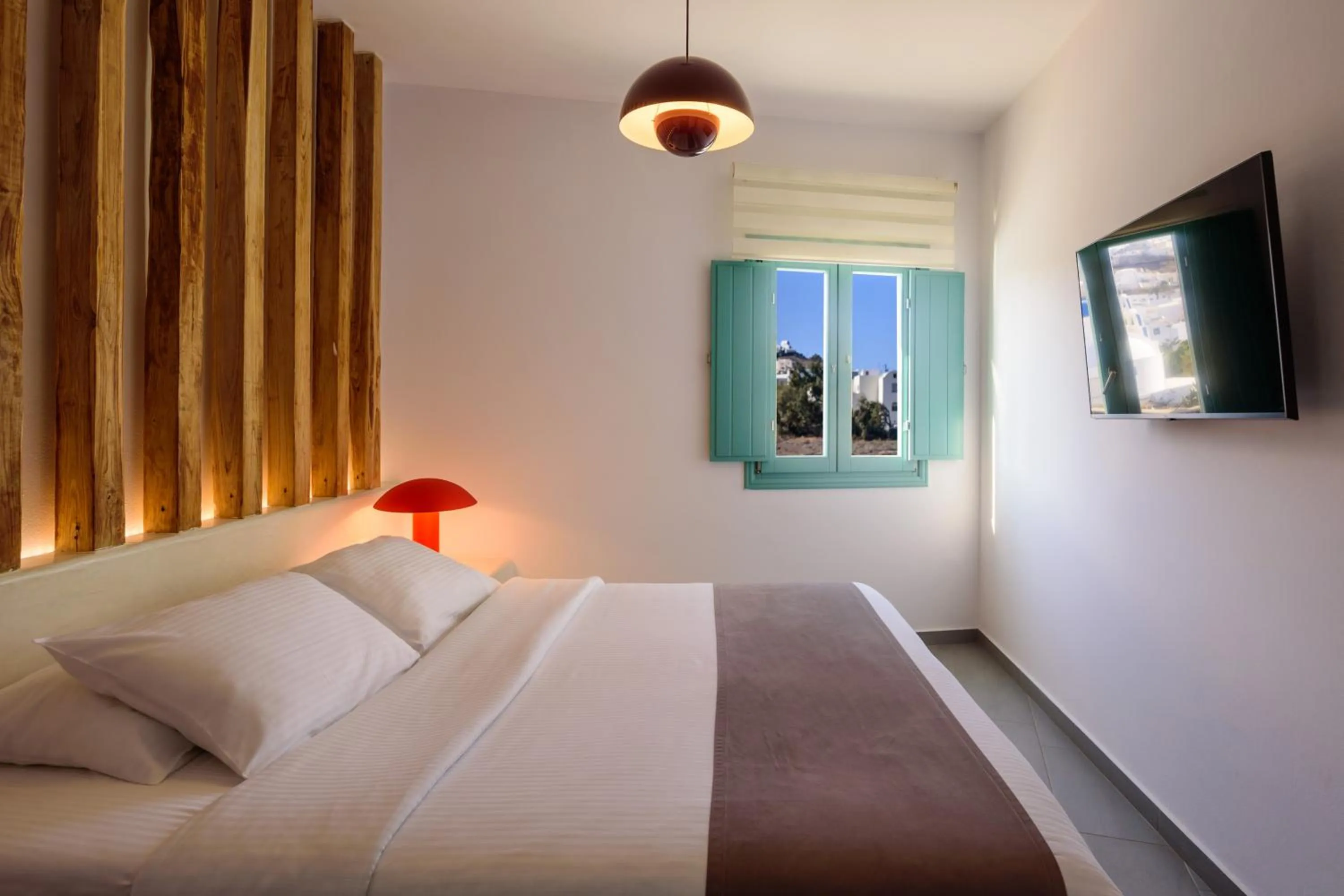 Bed in Neptune Luxury Suites