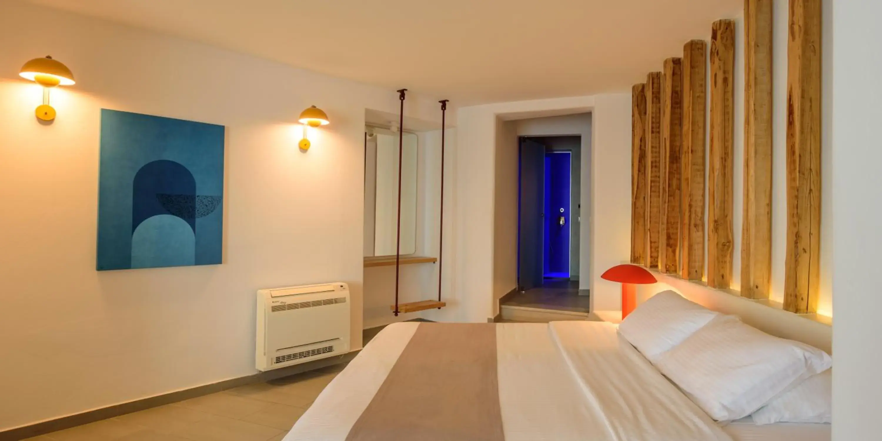 Bed in Neptune Luxury Suites Bed in Neptune Luxury Suites