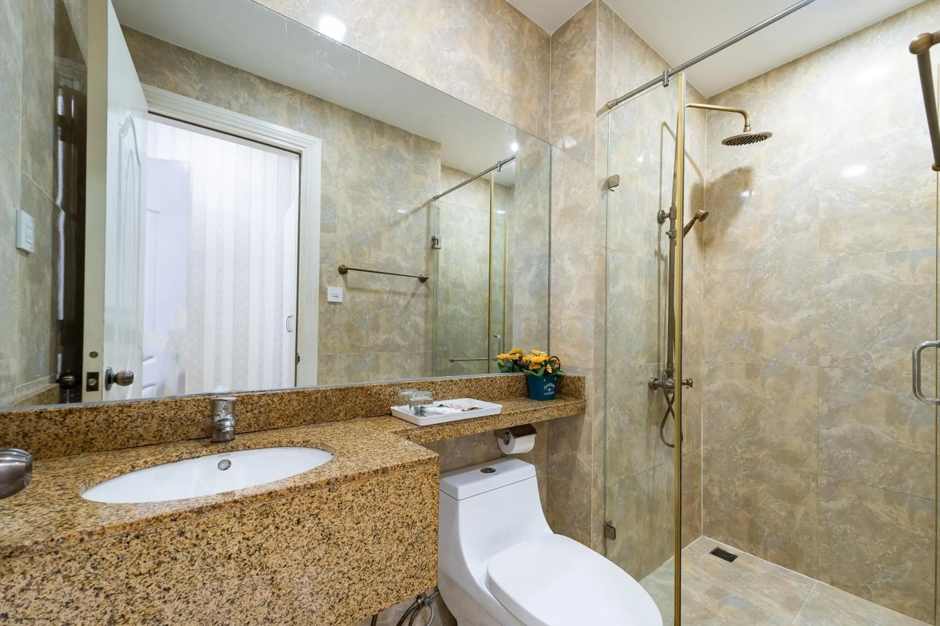Bathroom in WIN hotel & Apartment