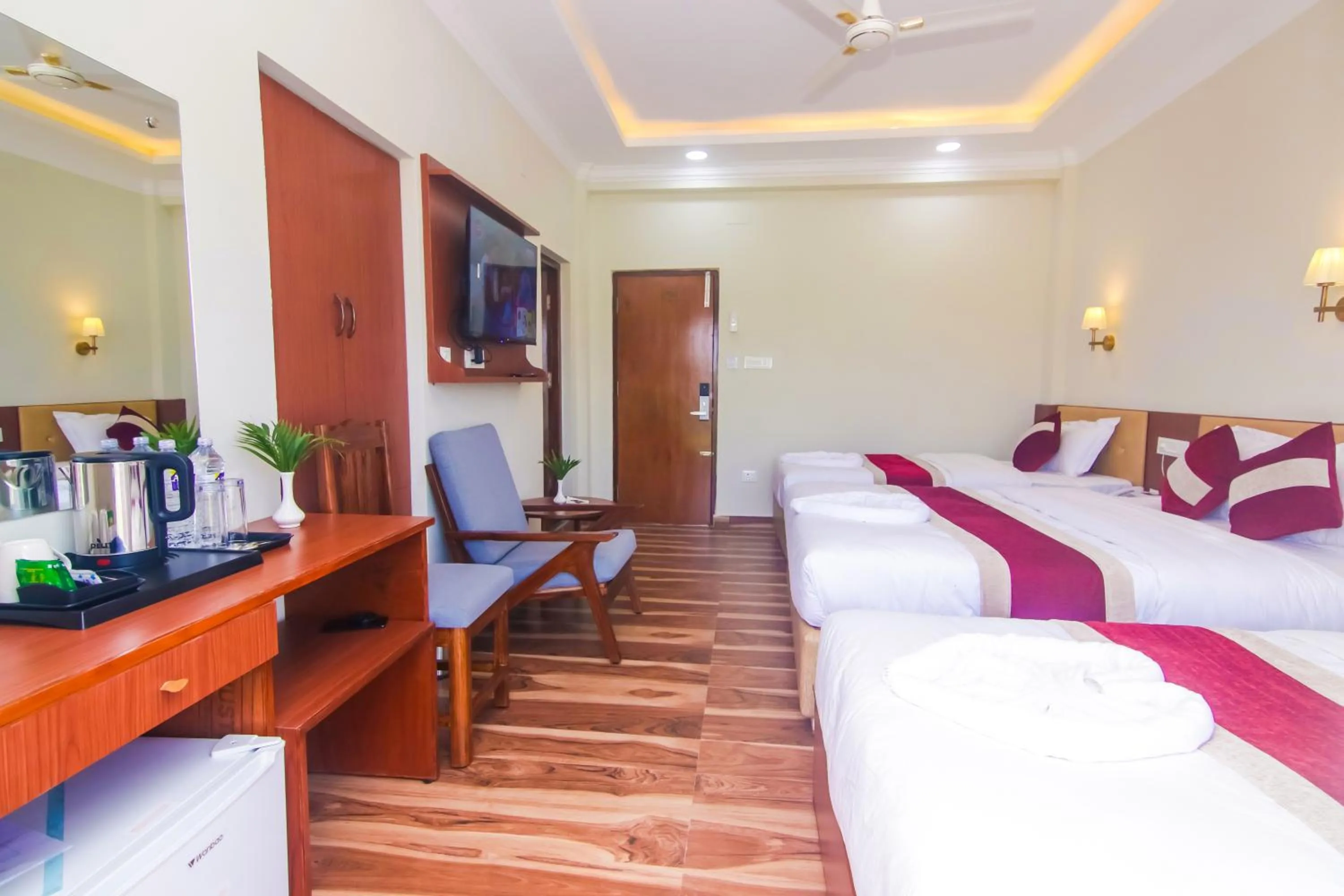 Bed in Hotel Yatra Sauraha Pvt Ltd