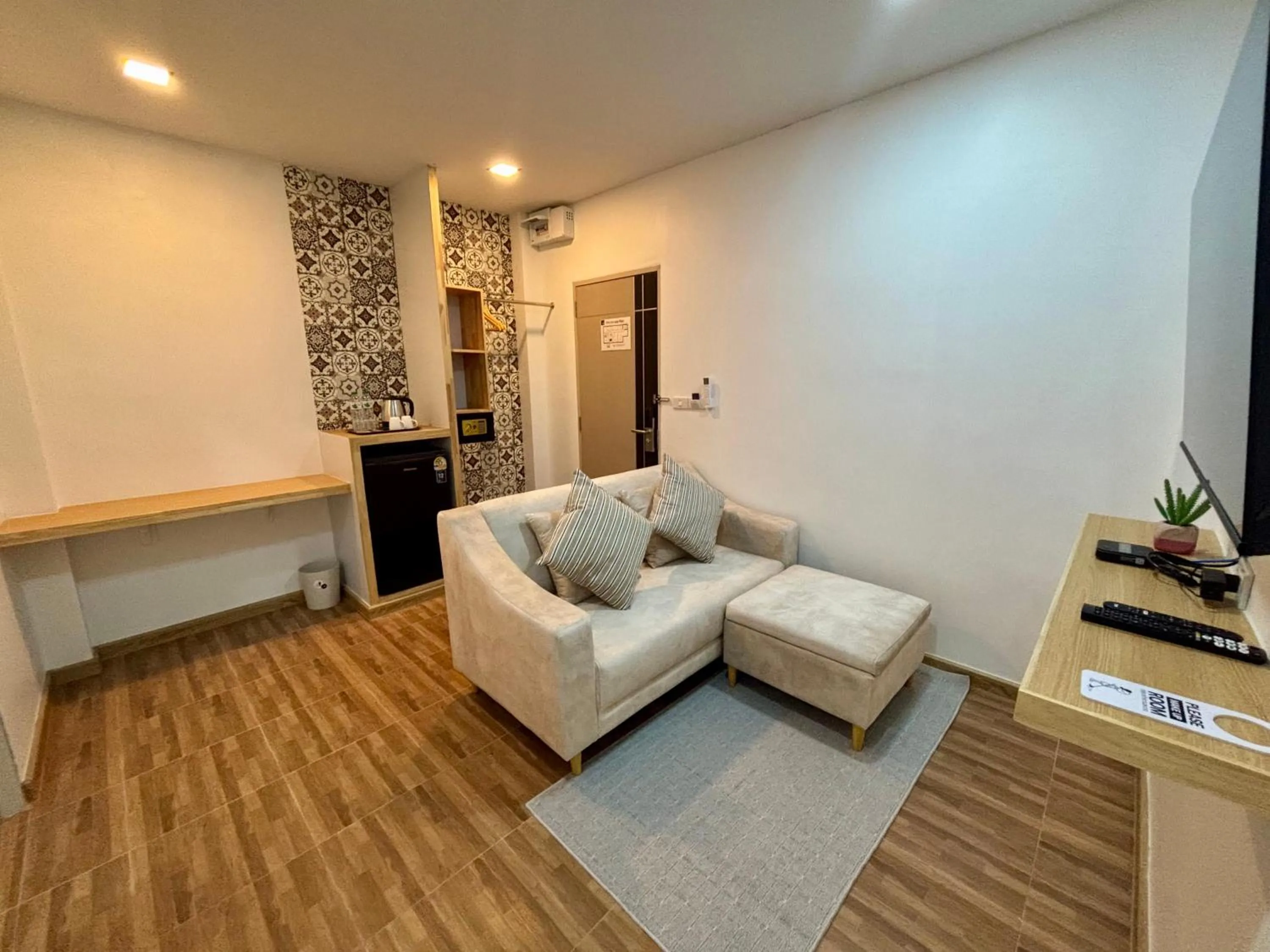 Living room in Charm Hostel at Pratumnak