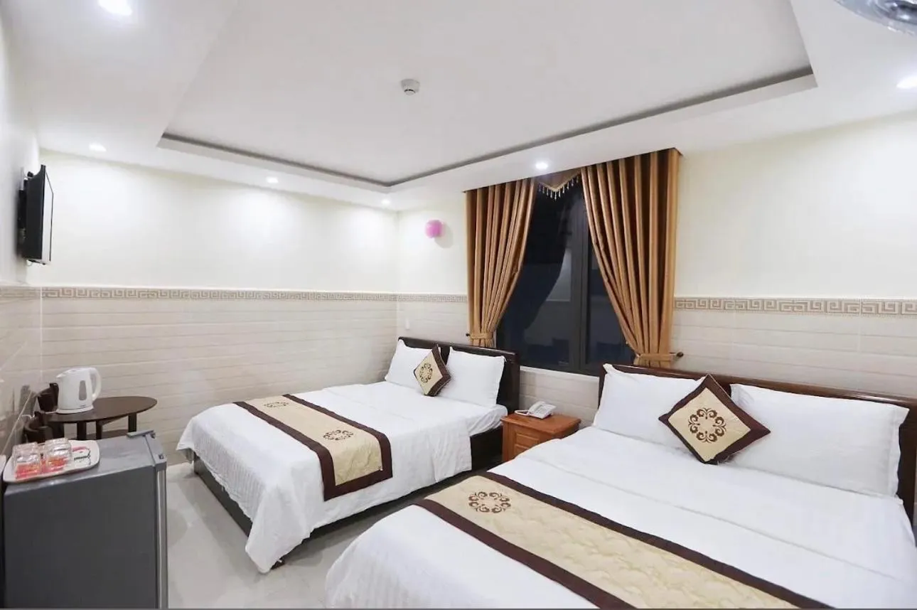 Bed in Bear Hotel & Homestay