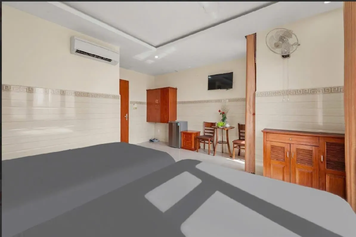 Bed in Bear Hotel & Homestay