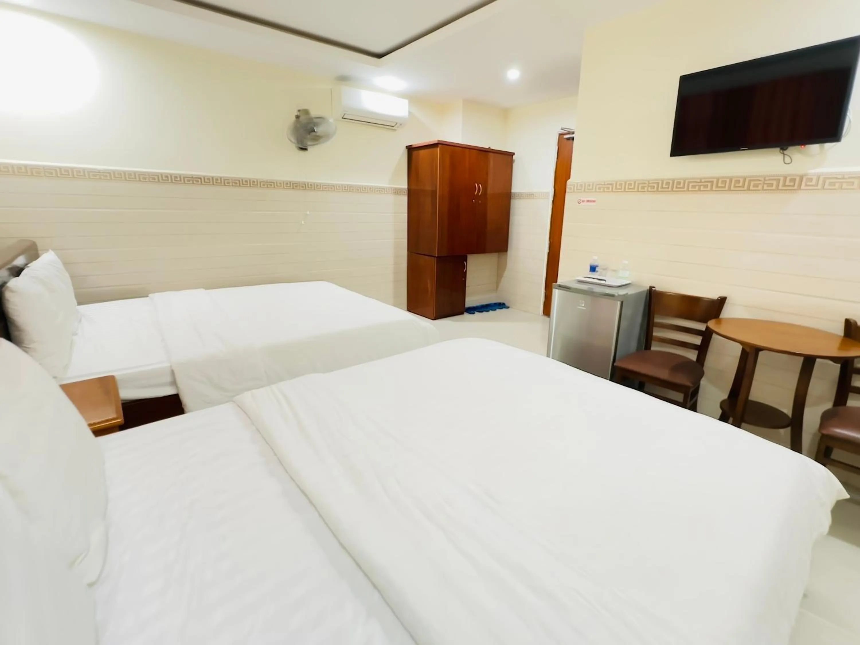 Bed in Bear Hotel & Homestay