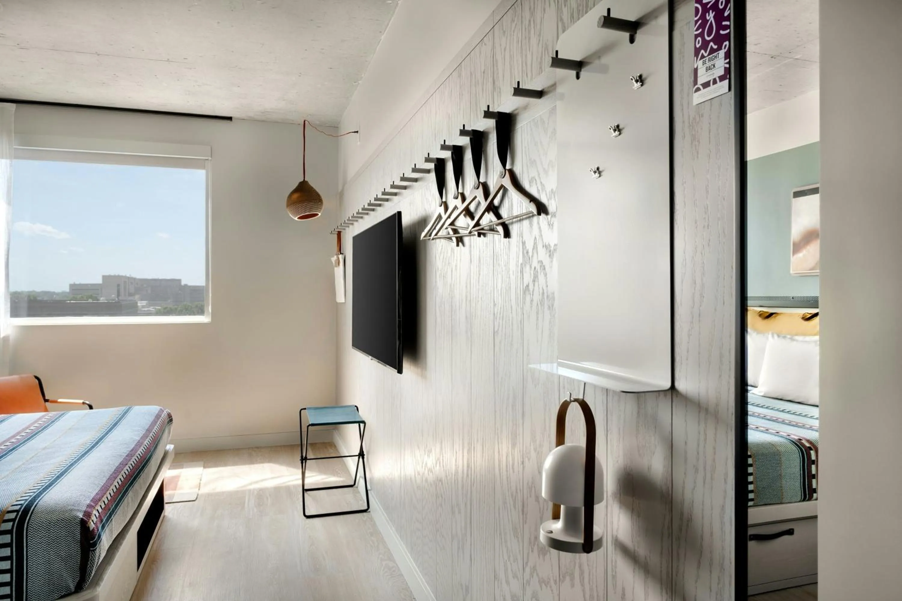 Photo of the whole room, Bed in Moxy Charlotte Downtown