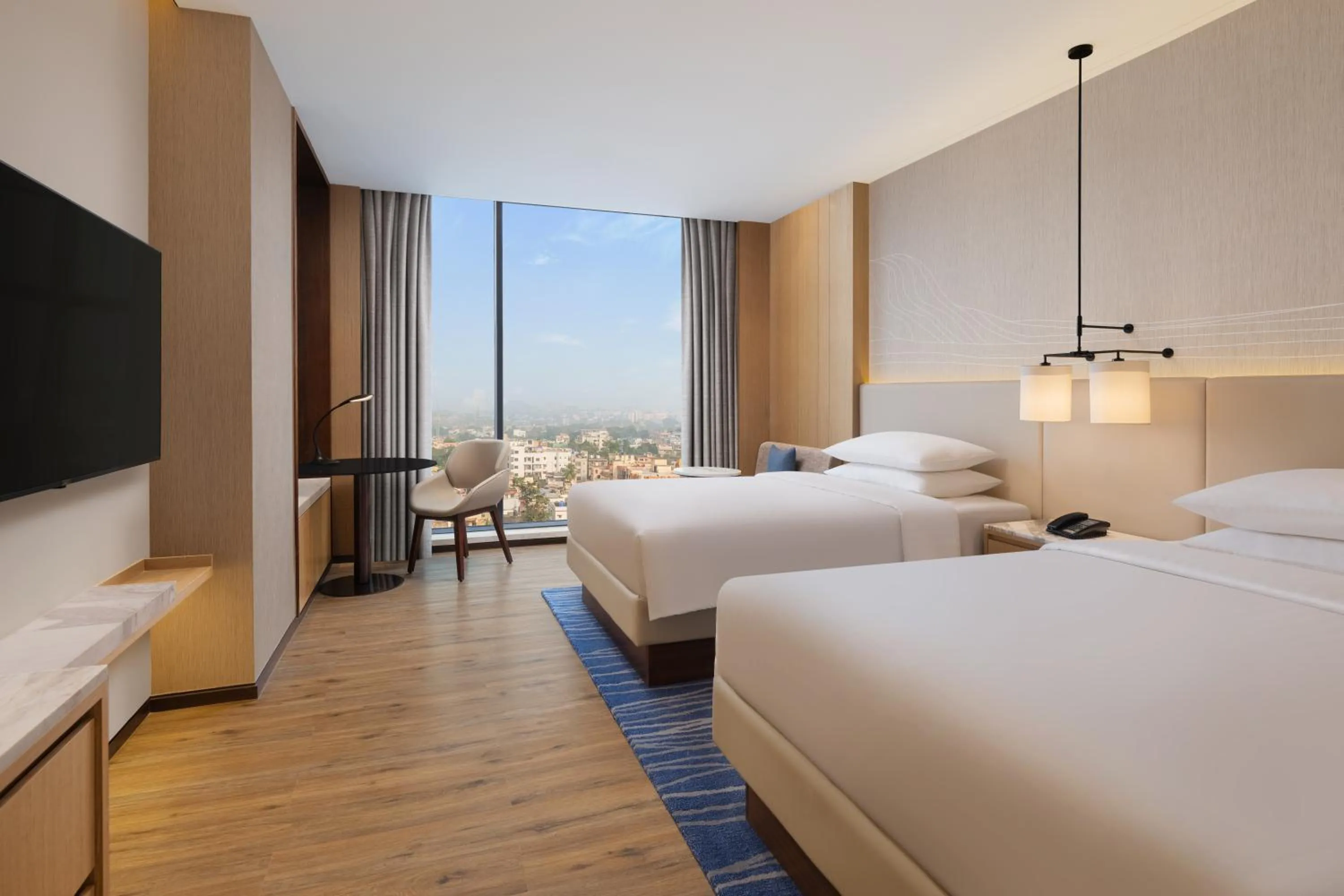 Photo of the whole room, Bed in Courtyard by Marriott Ranchi