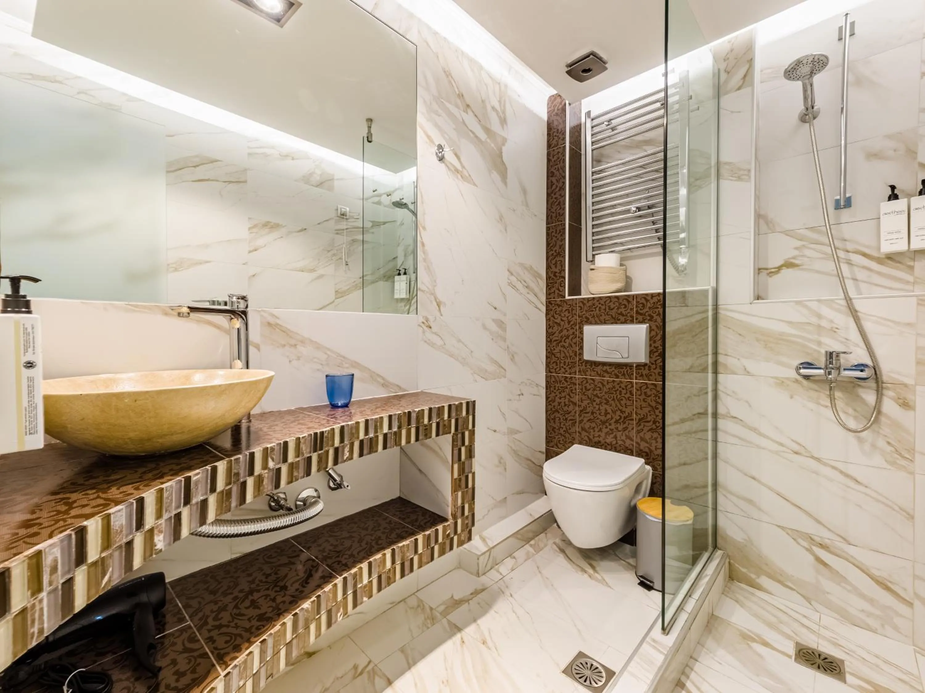 Shower in Alpha Luxury Suites