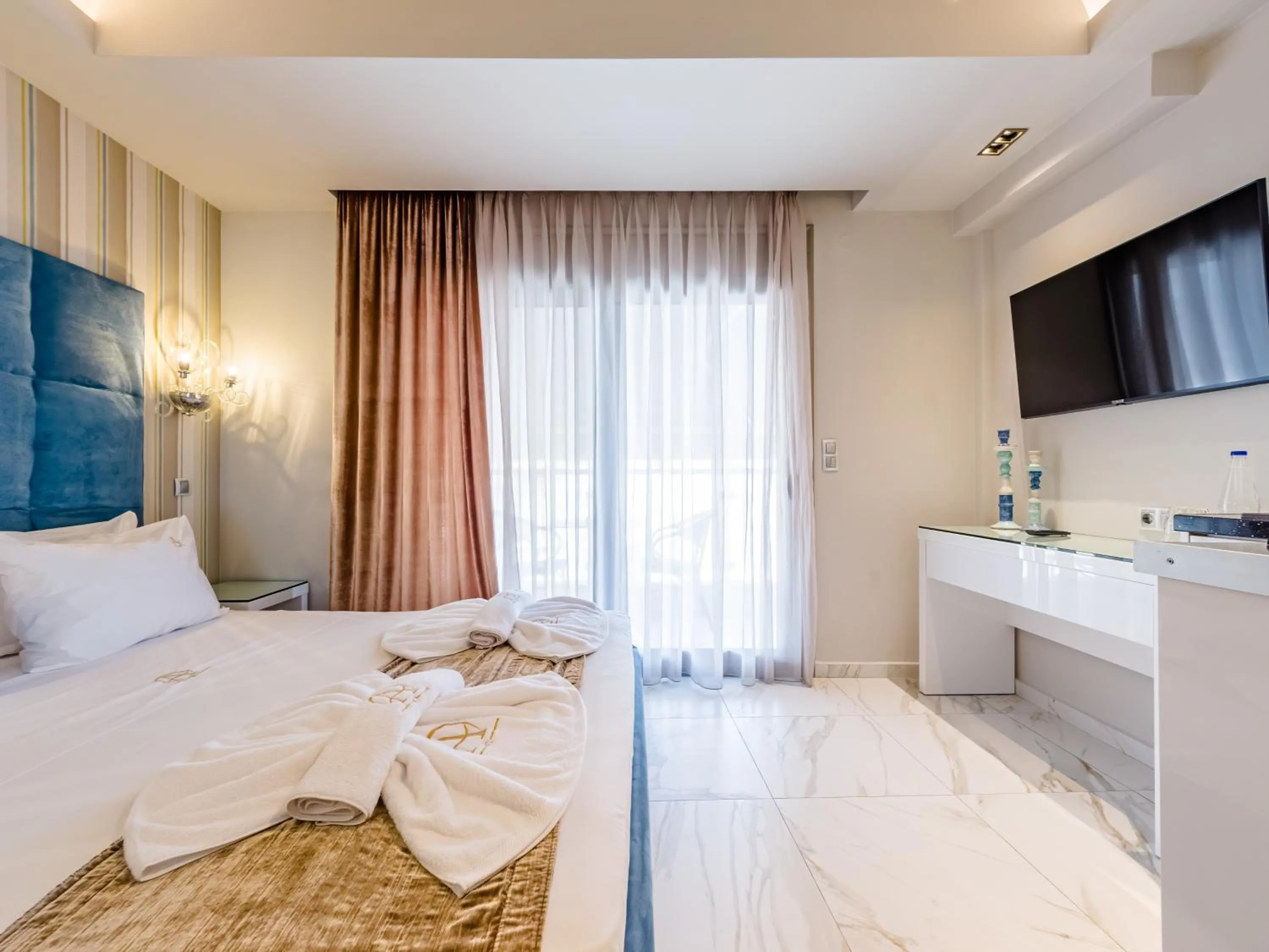 Bed in Alpha Luxury Suites