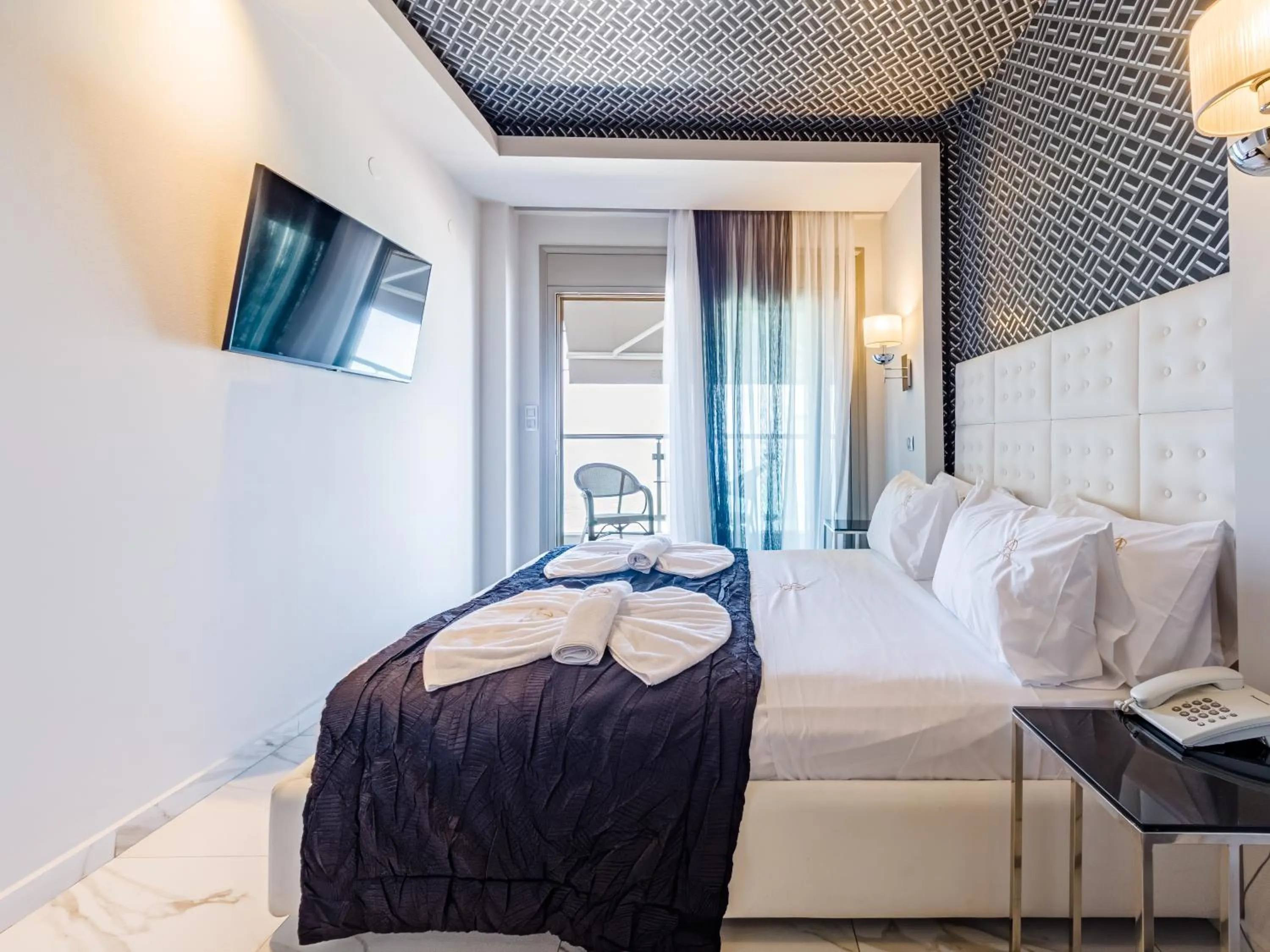 TV and multimedia, Bed in Alpha Luxury Suites