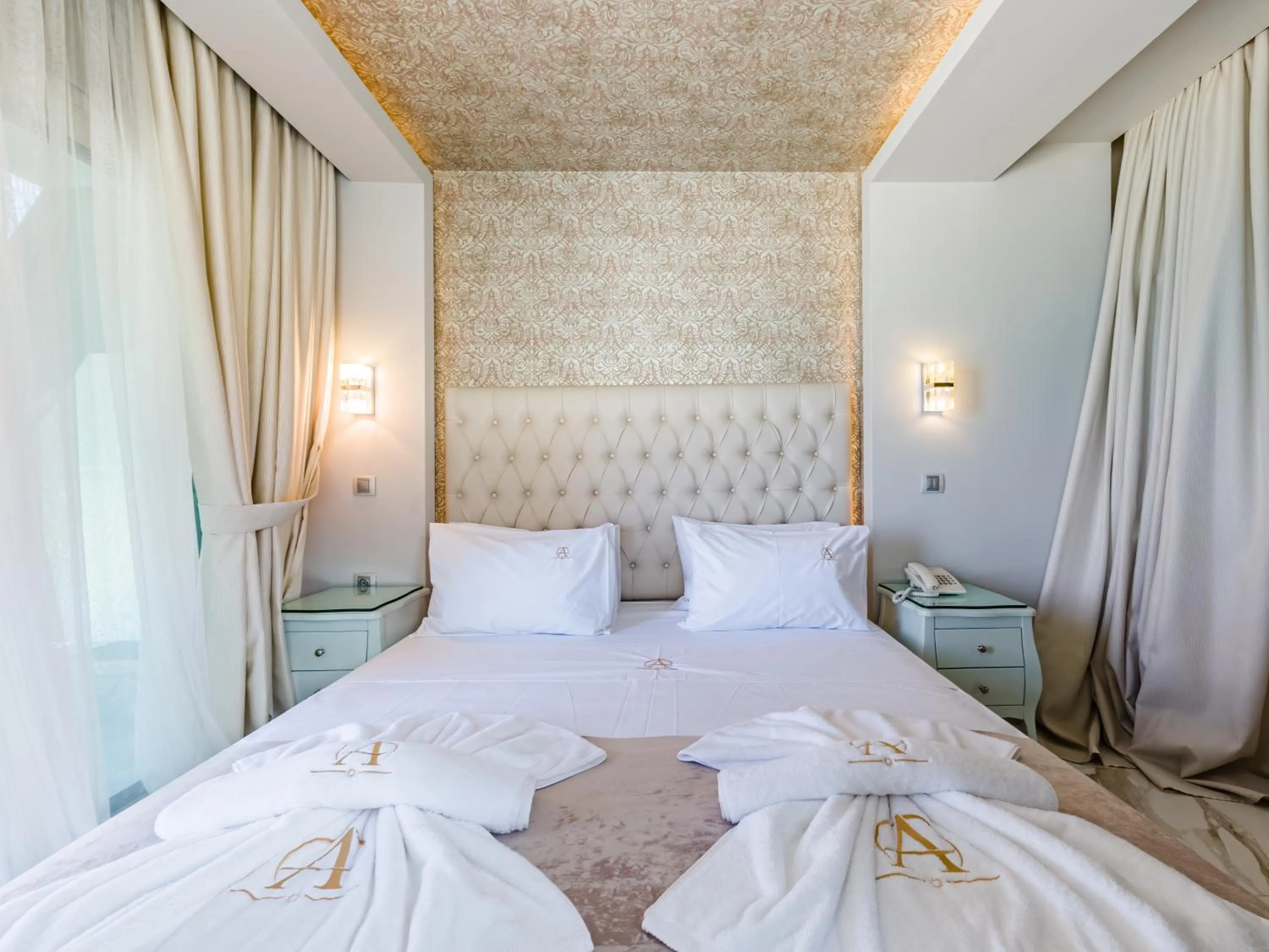 Bed in Alpha Luxury Suites