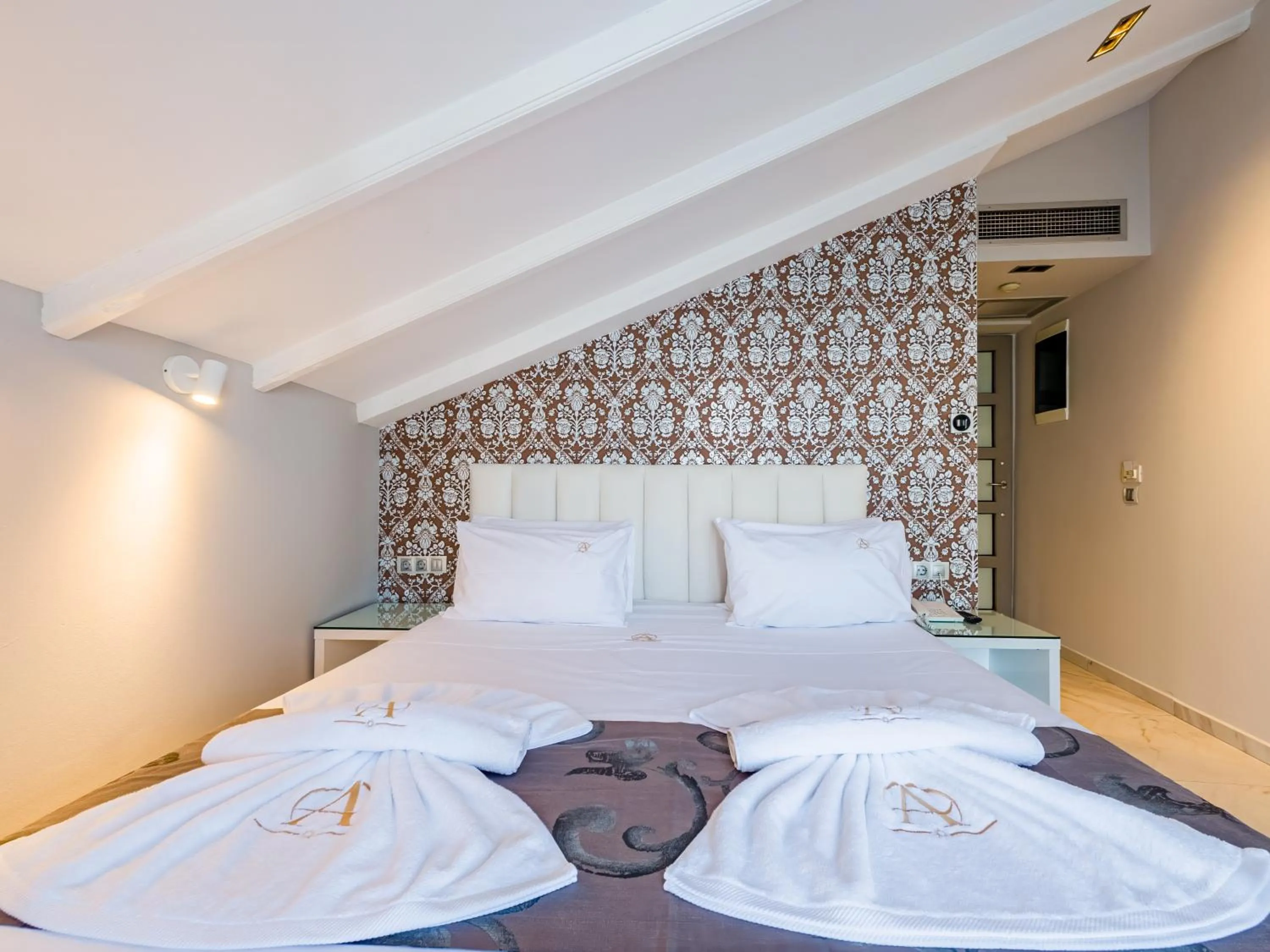 Photo of the whole room, Bed in Alpha Luxury Suites