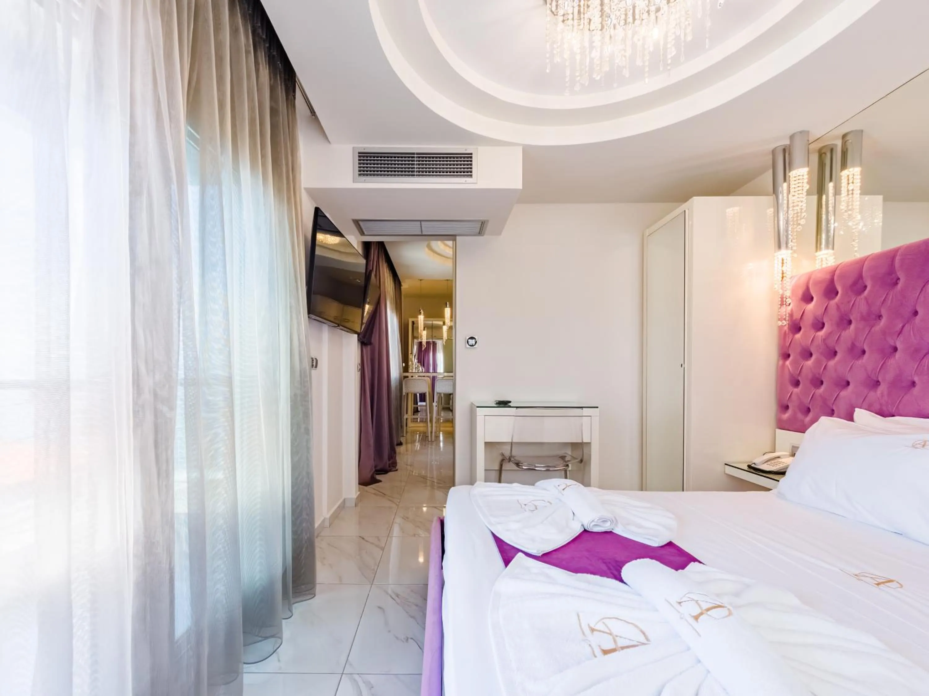 Bed in Alpha Luxury Suites