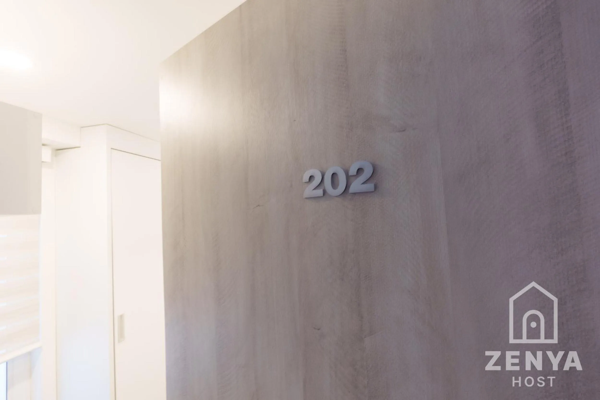 Property logo or sign in Recovery house by Zenya Host