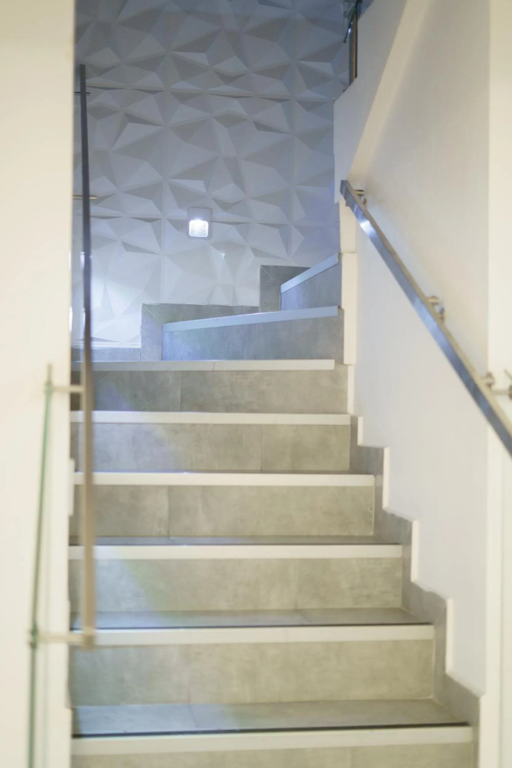 Facade/entrance in Recovery house by Zenya Host