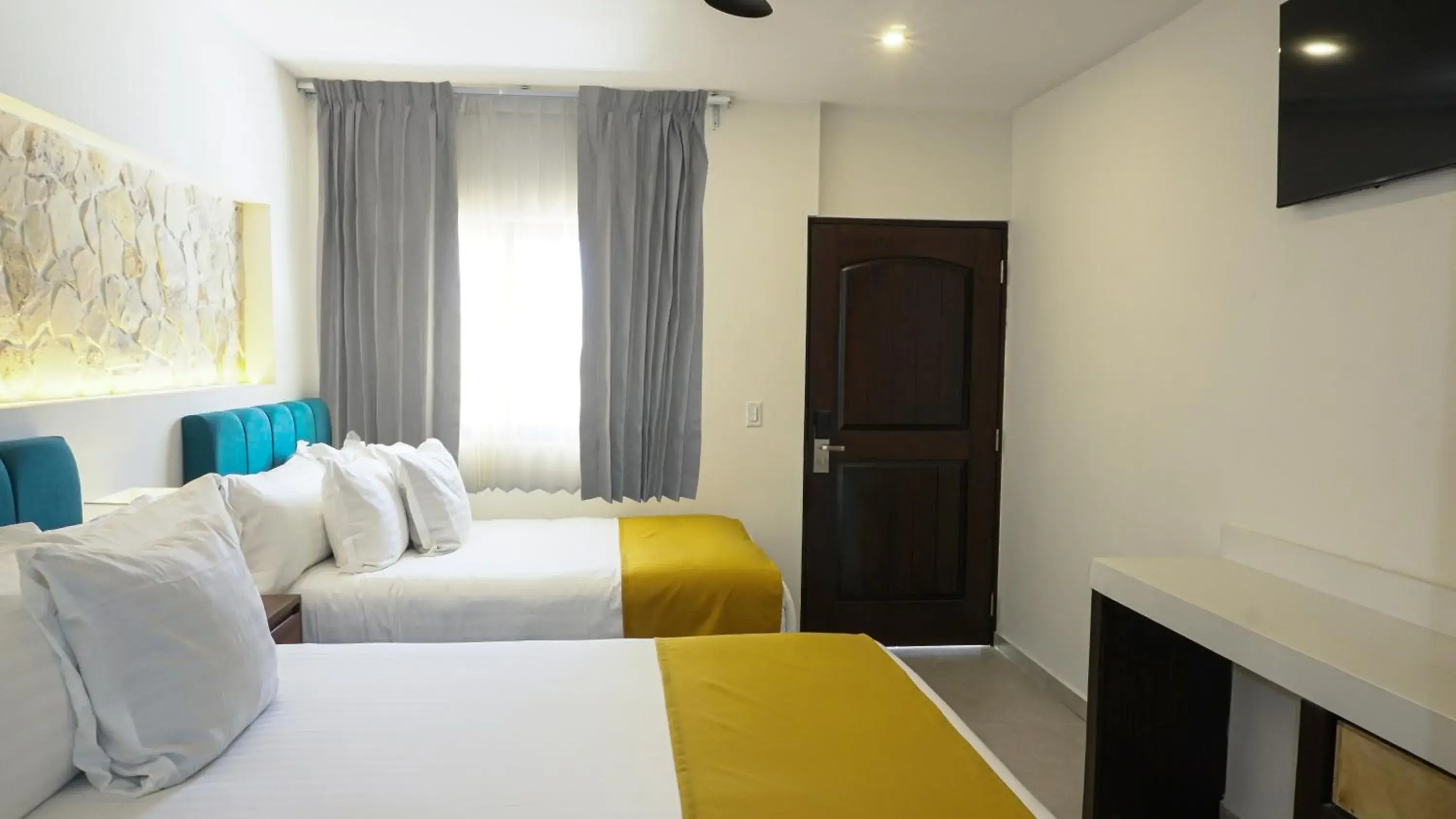 Bed in Hotel Loreto Palmar Bed in Hotel Loreto Palmar