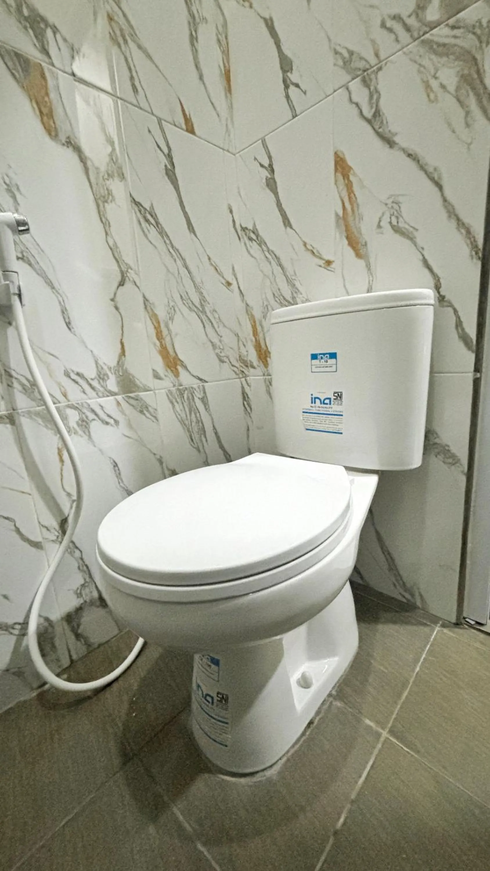 Toilet in Griya Inn