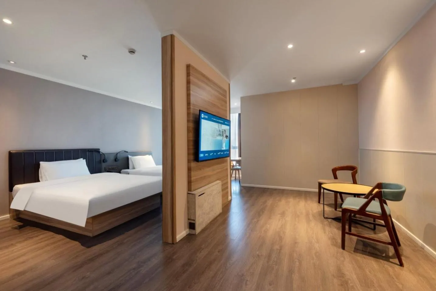 Living room, Bed in Hanting Premium Hotel Shanghai Caolu Finance College
