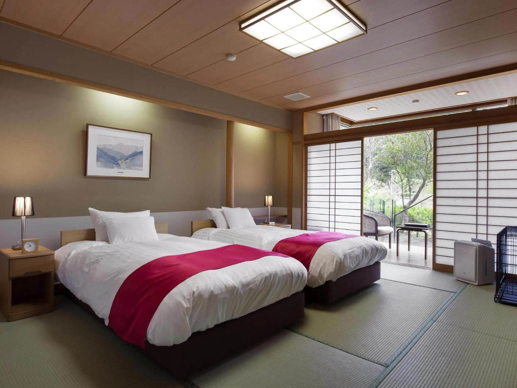 Bed in Matsusaka Wan Wan Paradise Forest Hotel