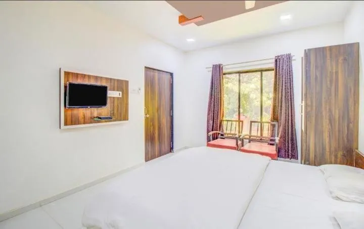 Bed in Girichintan Bunglow