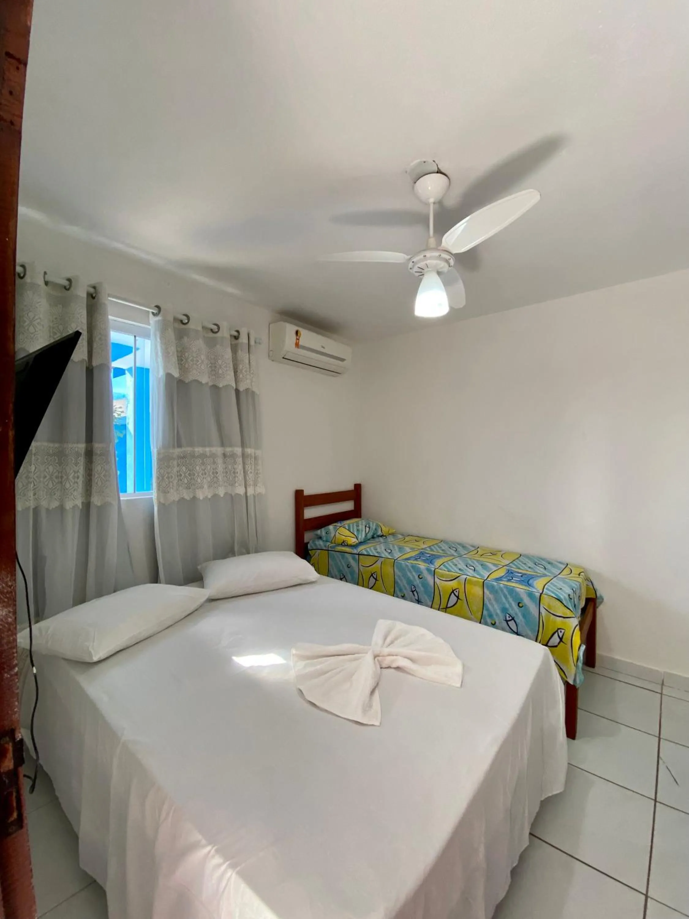 Photo of the whole room, Bed in Pousada Estrela do Norte