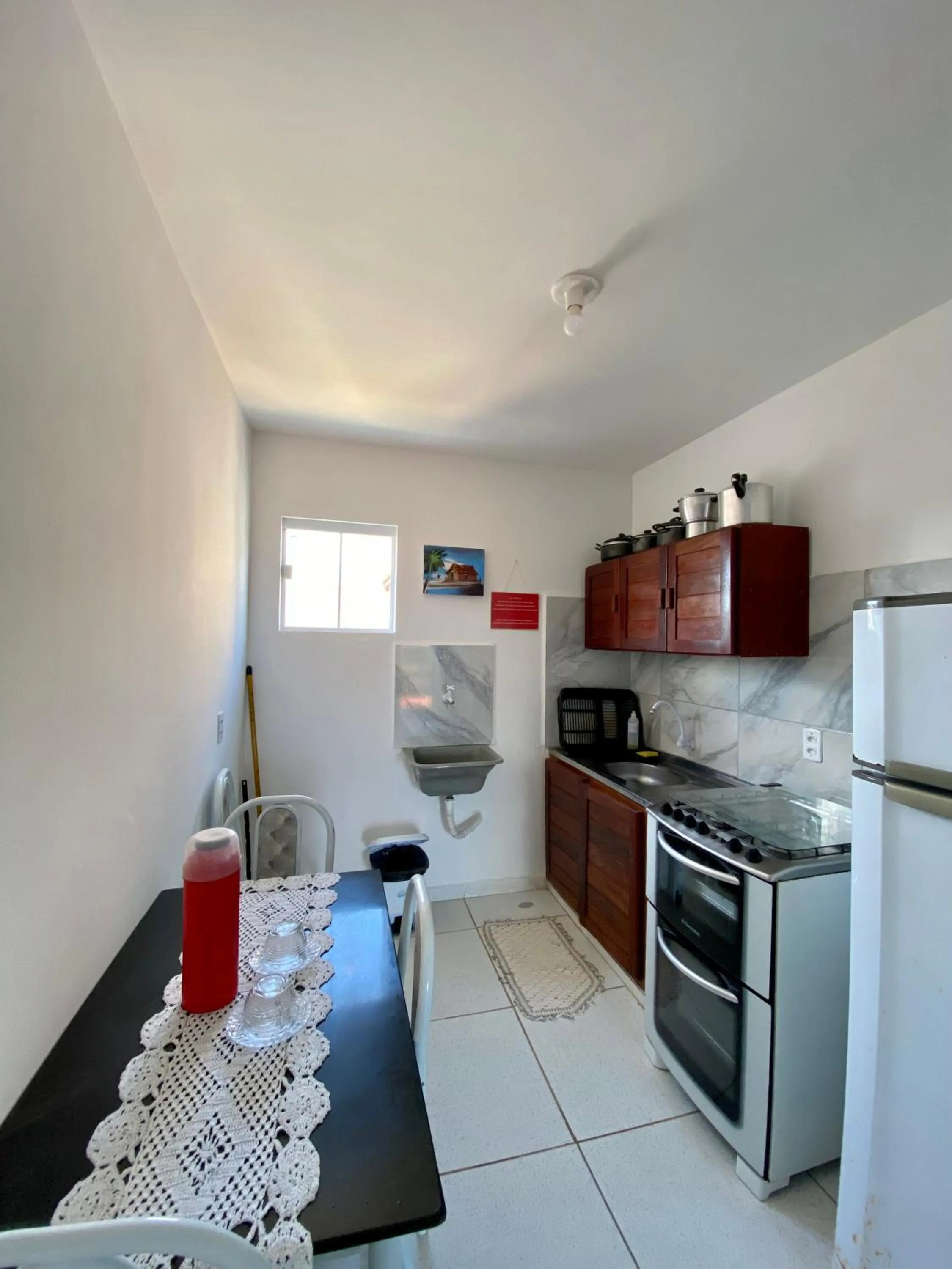 Kitchen or kitchenette in Pousada Estrela do Norte