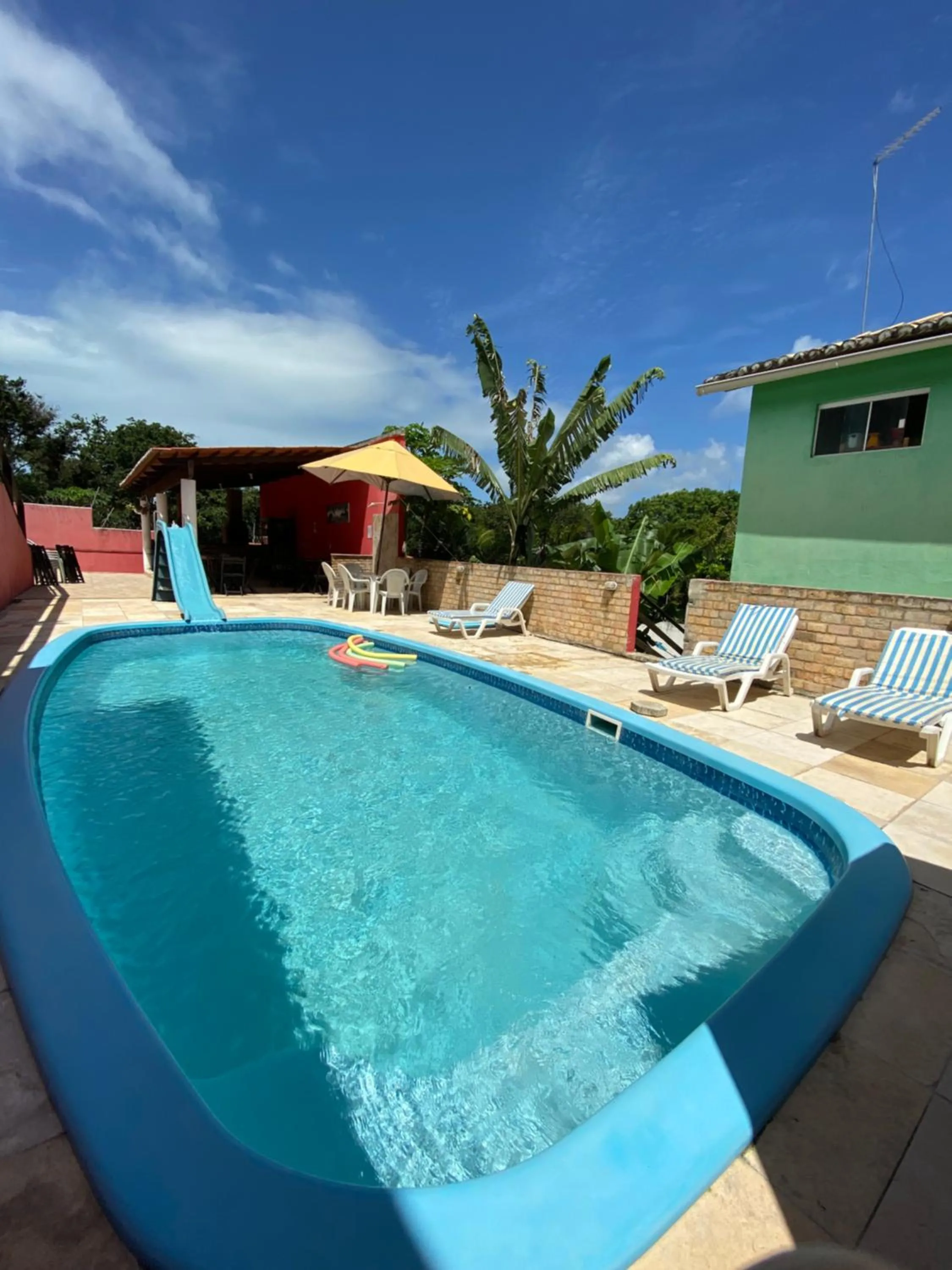 Swimming pool in Pousada Estrela do Norte