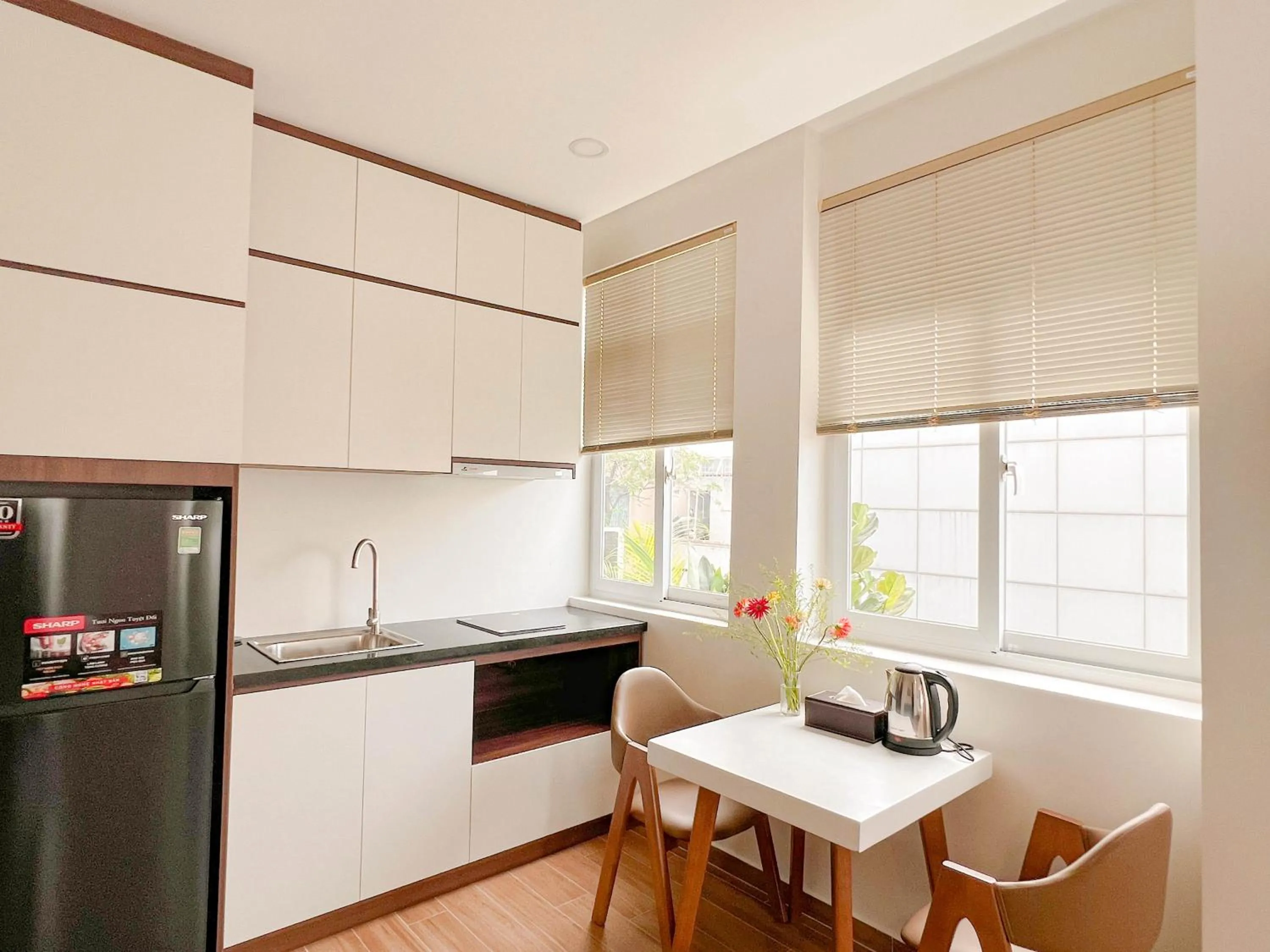 Kitchen or kitchenette in Heyday apartment