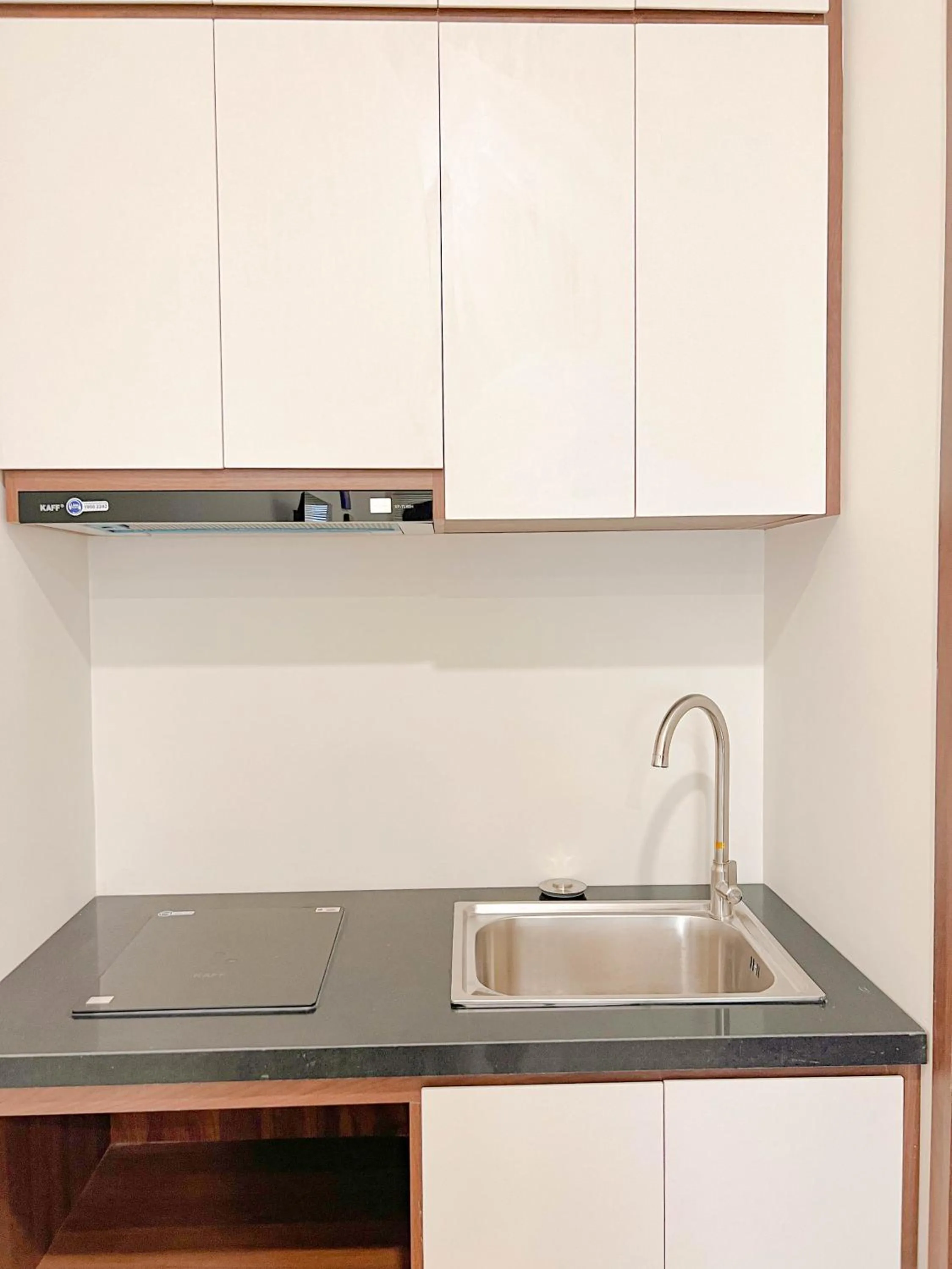 Kitchen or kitchenette in Heyday apartment