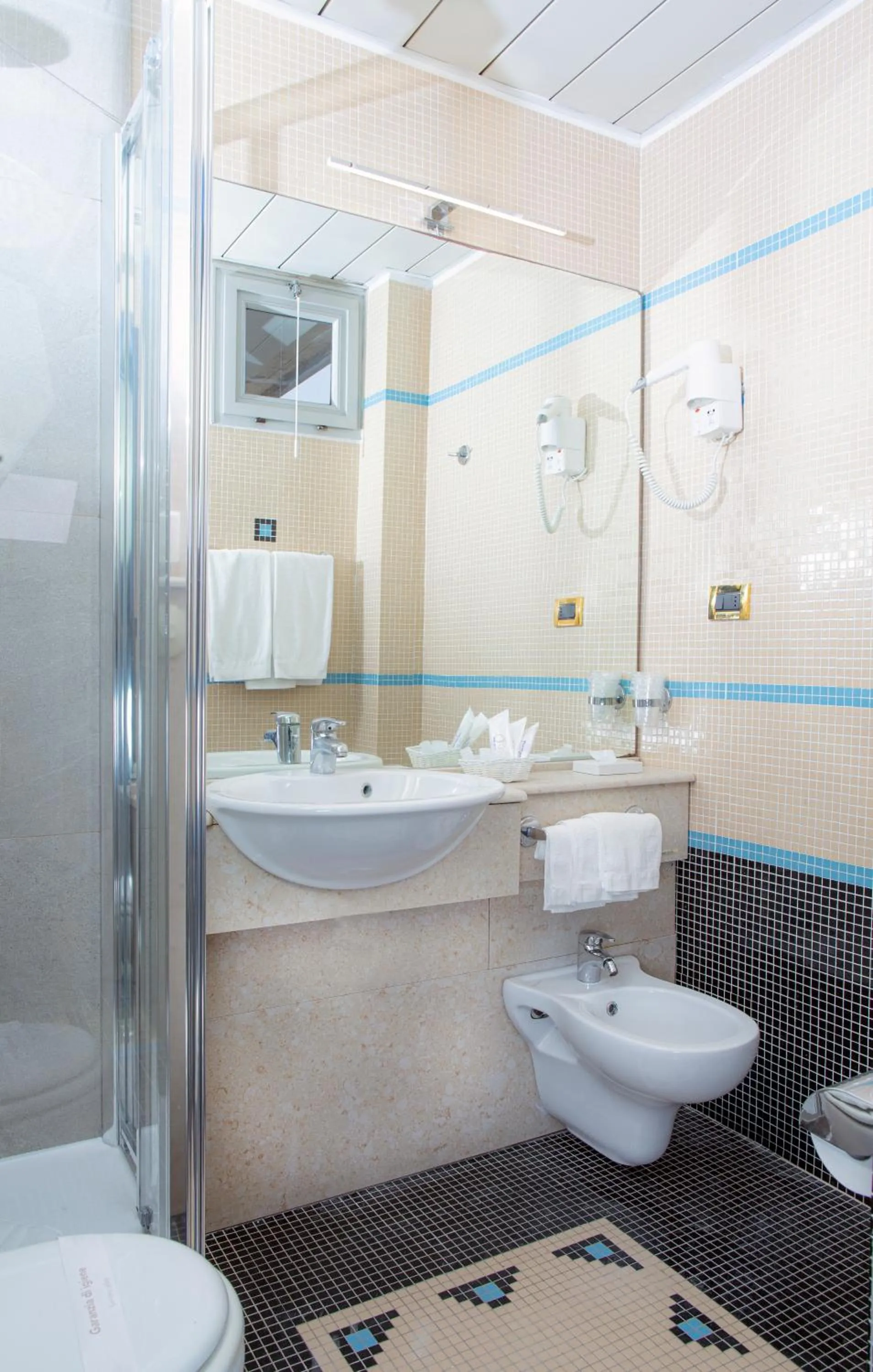 Bathroom in Hotel Della Baia