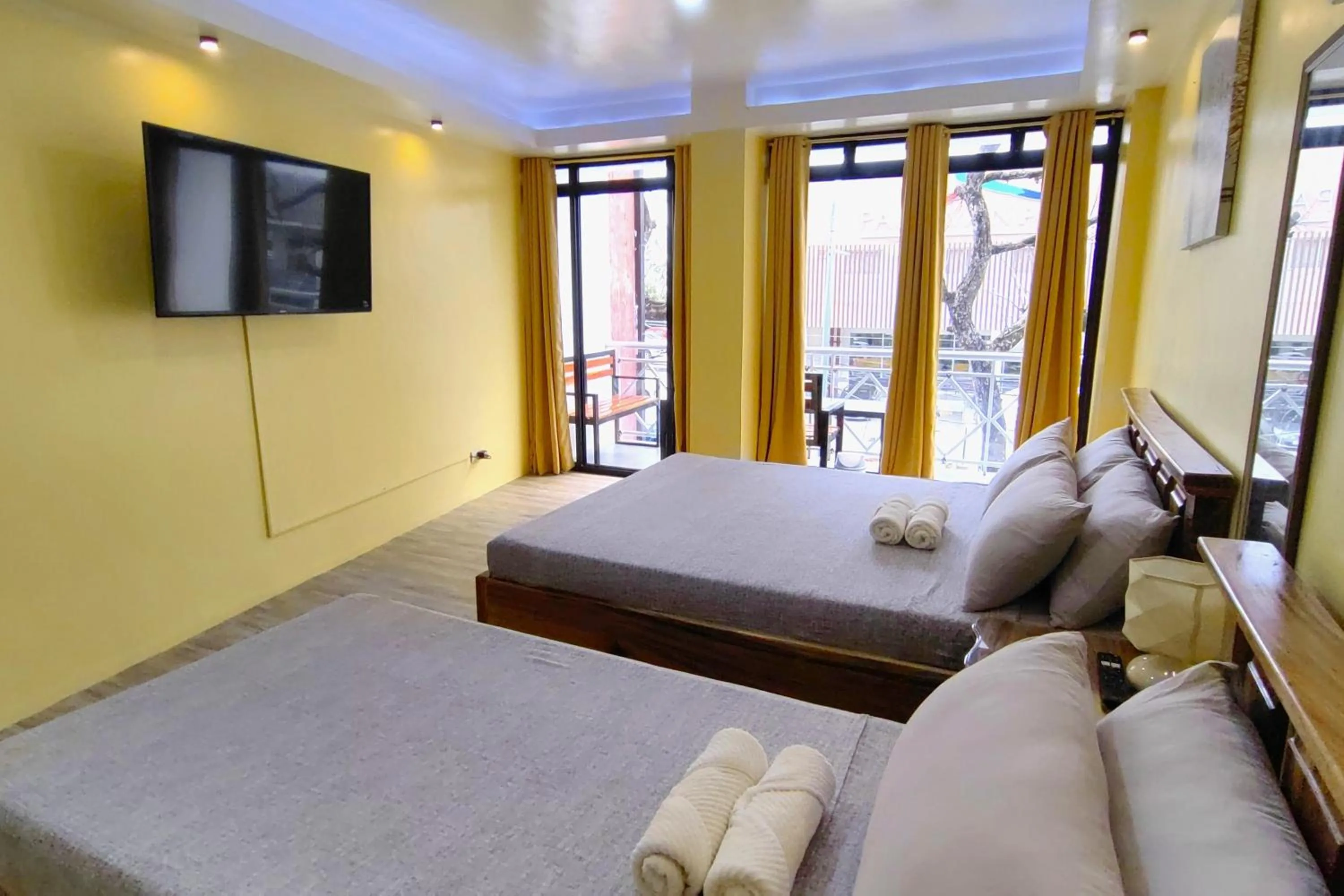 Bed in Inn Ka Kay Mame near SM City Puerto Princesa