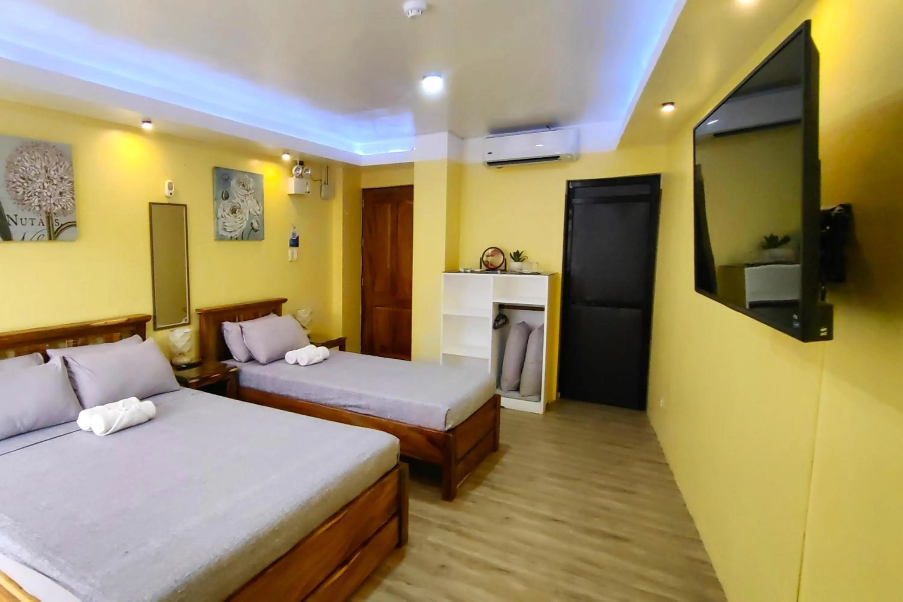 TV and multimedia, Bed in Inn Ka Kay Mame near SM City Puerto Princesa
