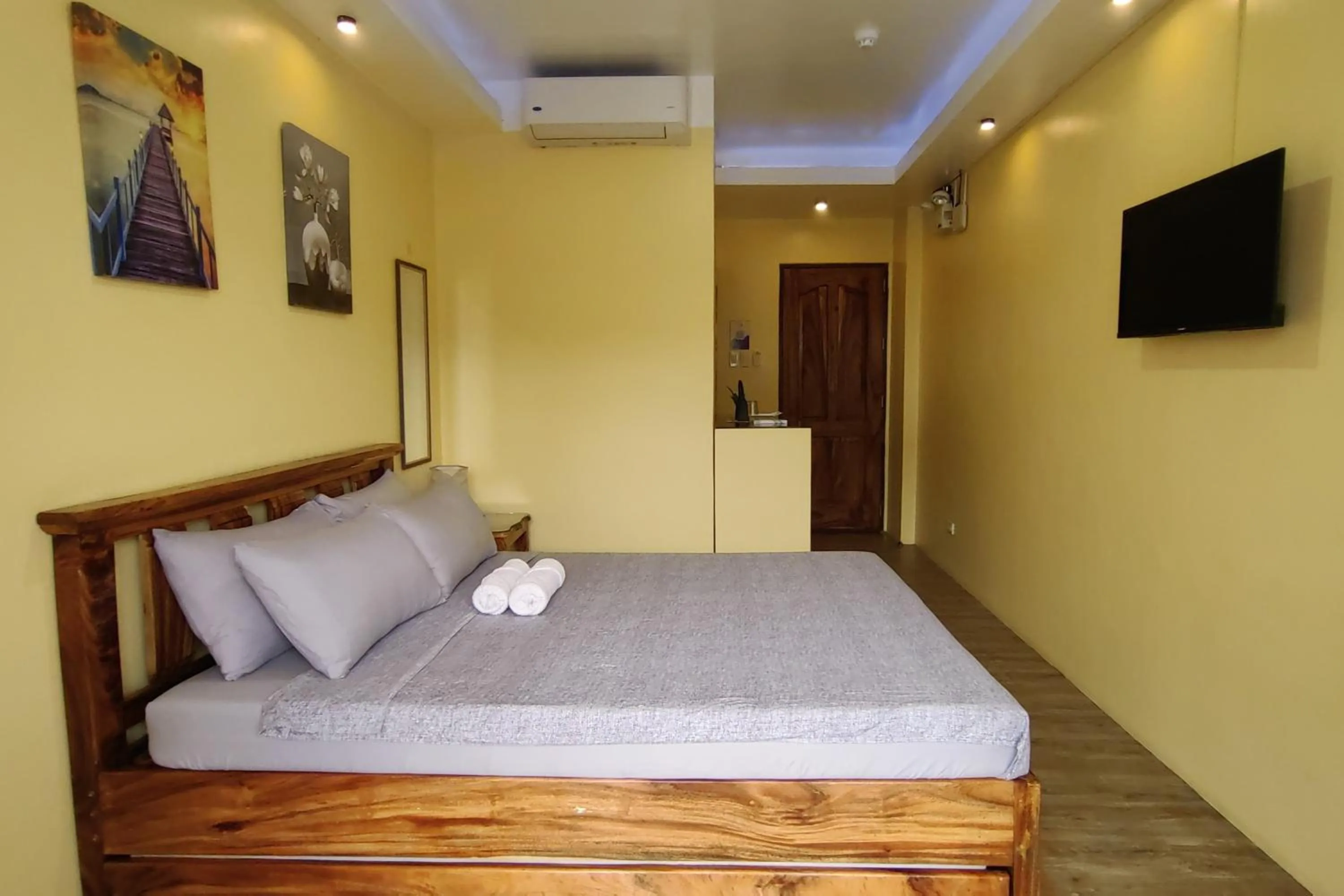 Bed in Inn Ka Kay Mame near SM City Puerto Princesa