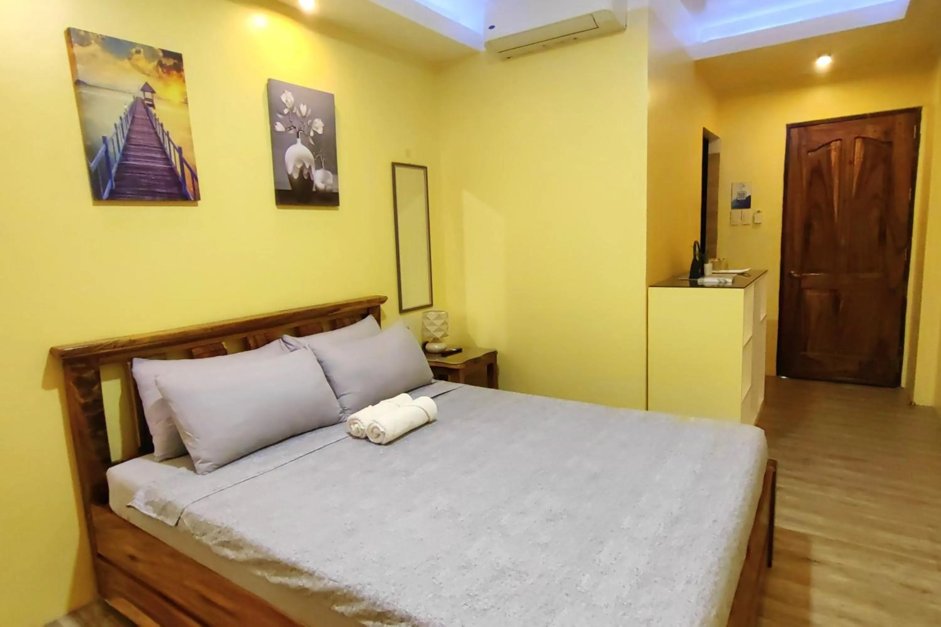 Bed in Inn Ka Kay Mame near SM City Puerto Princesa