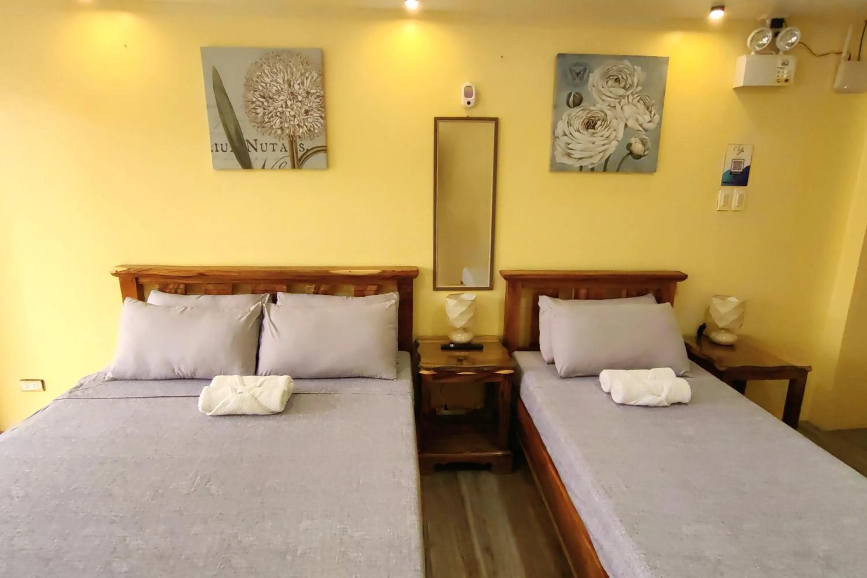 Bed in Inn Ka Kay Mame near SM City Puerto Princesa