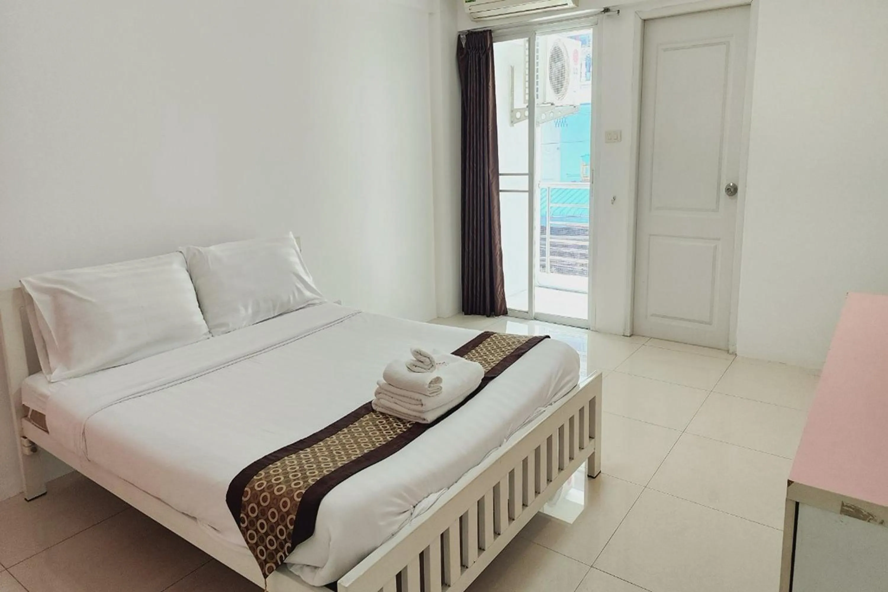 Bed in Zenith Life Hotel